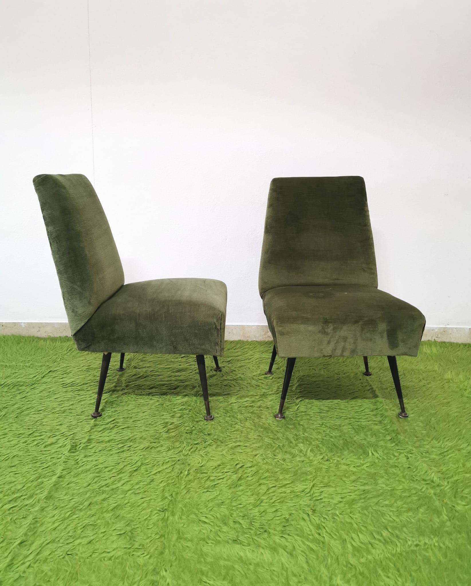 Elegant set of 2 small armchairs upholstered in smooth velvet in green shades, with metal feet and brass tips. Italian production from the 1960s.