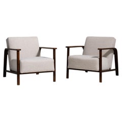 Par de sillones Art Déco de mediados de siglo con tapizado de bouclé, Francia, 1920-1929