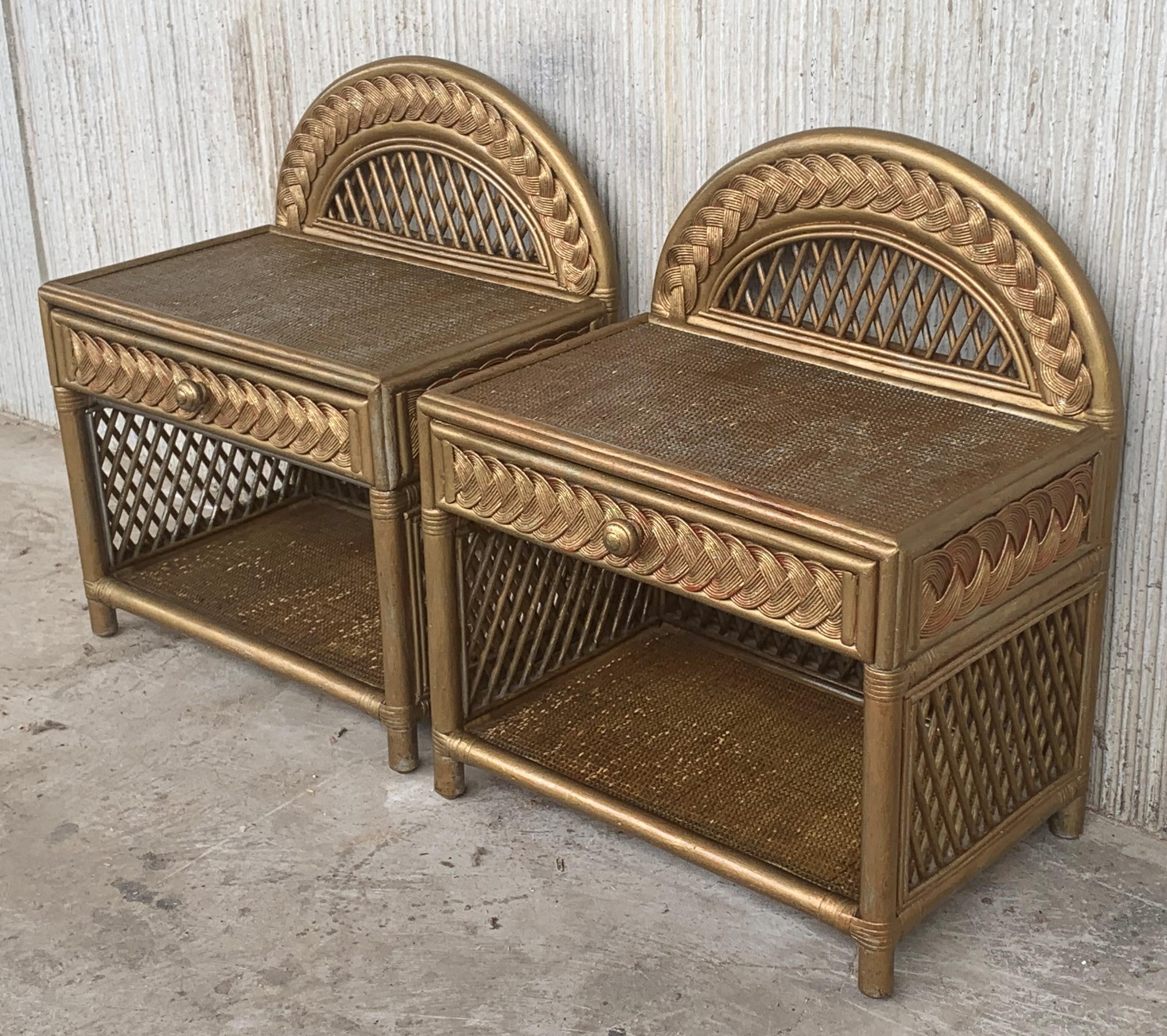 Midcentury pair of bamboo and rattan gold nightstands with drawer and low shelve
Streamline stick rattan side table nightstand with grass-mat coverings, edges are finished with bentwood nails.
All rattan, bamboo and wicker furniture has been