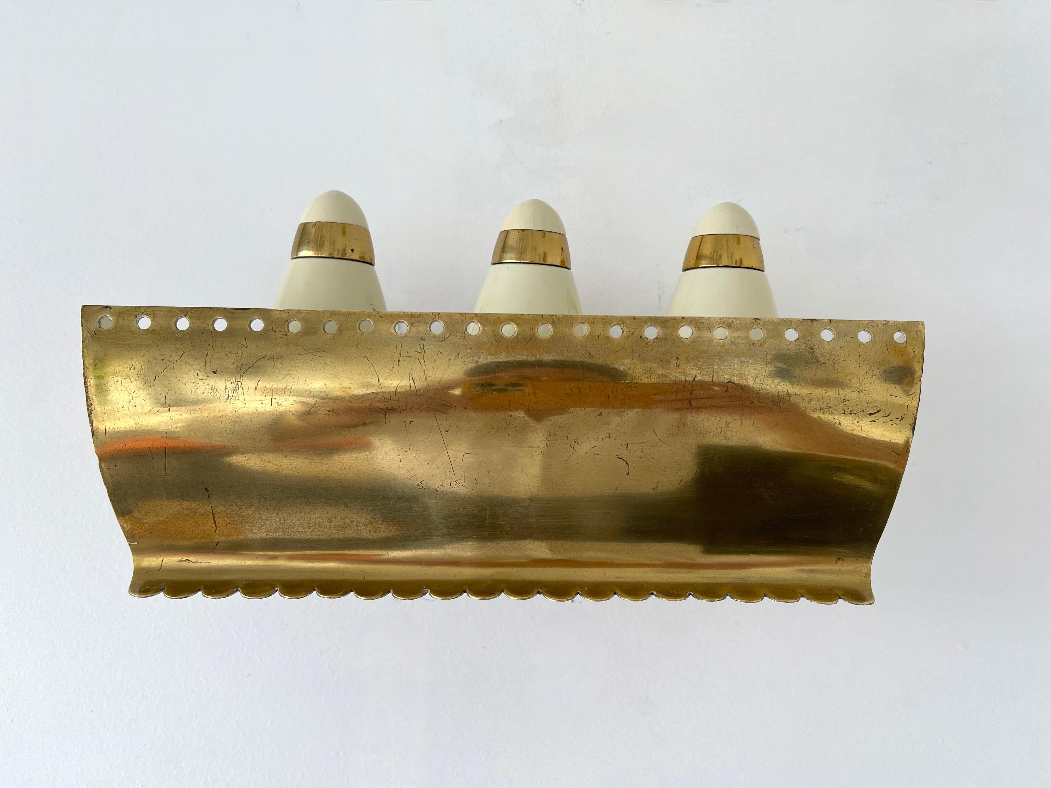 Mid-Century Modern Mid Century Pair of Brass and Enamelled Metal Sconces. Italy, 1950s