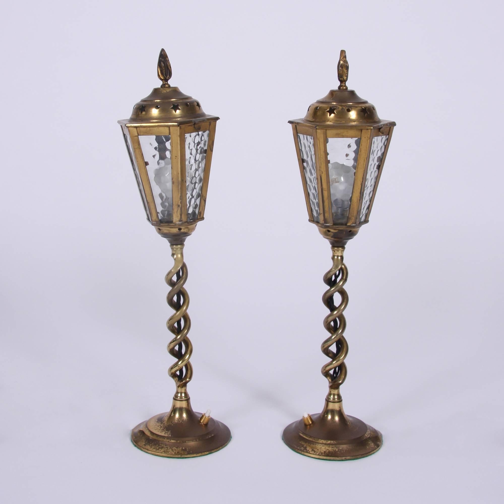 Pair of enchanting brass table lanterns. With beautiful star detailing. Swirling bases, and push button switches. 

In good condition. 

English, circa 1960.

Rewired and PAT tested.