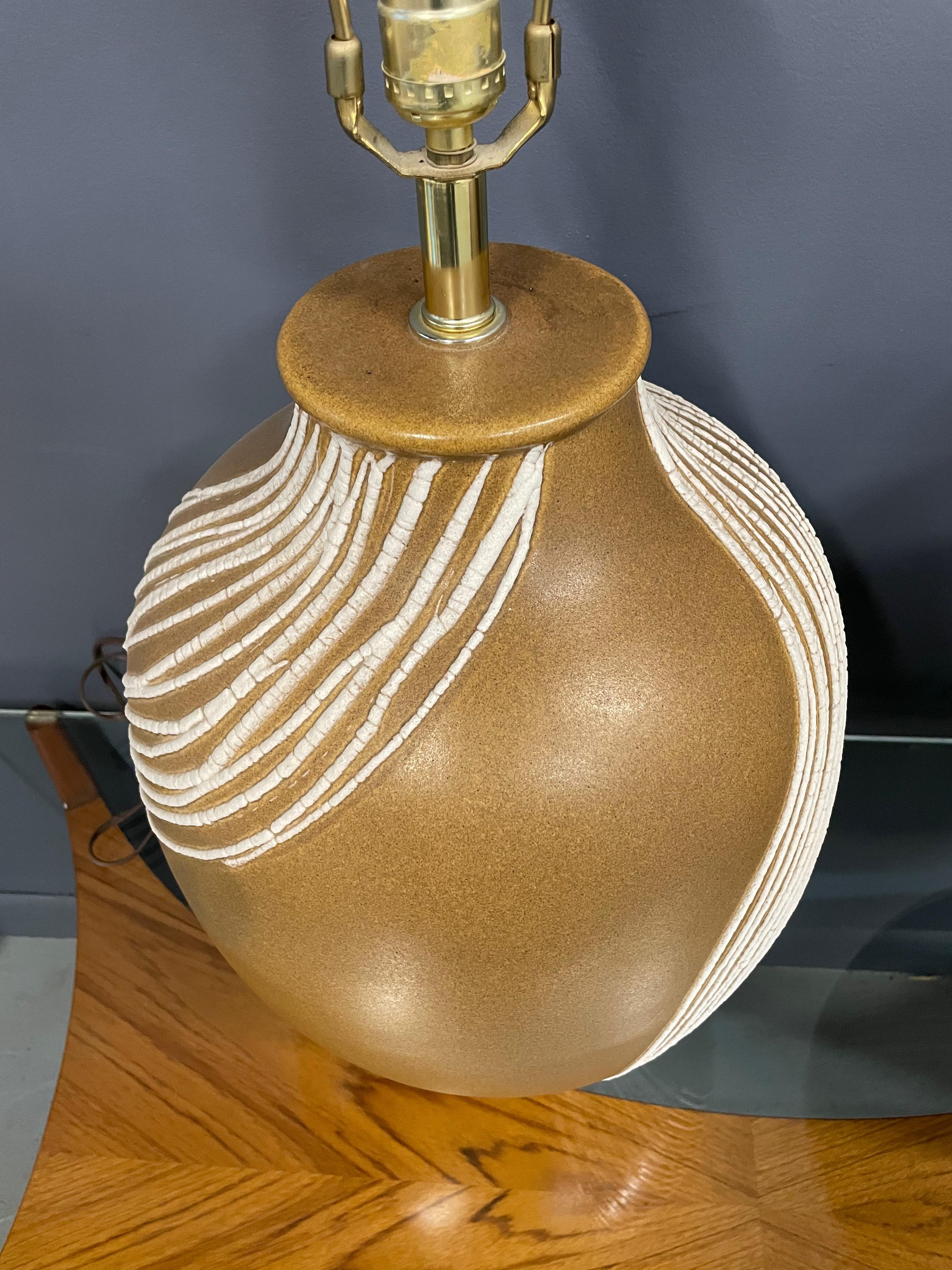 North American Mid Century Pair of Ceramic Caramel Colored Lamps with White Appliquéd Stripes For Sale