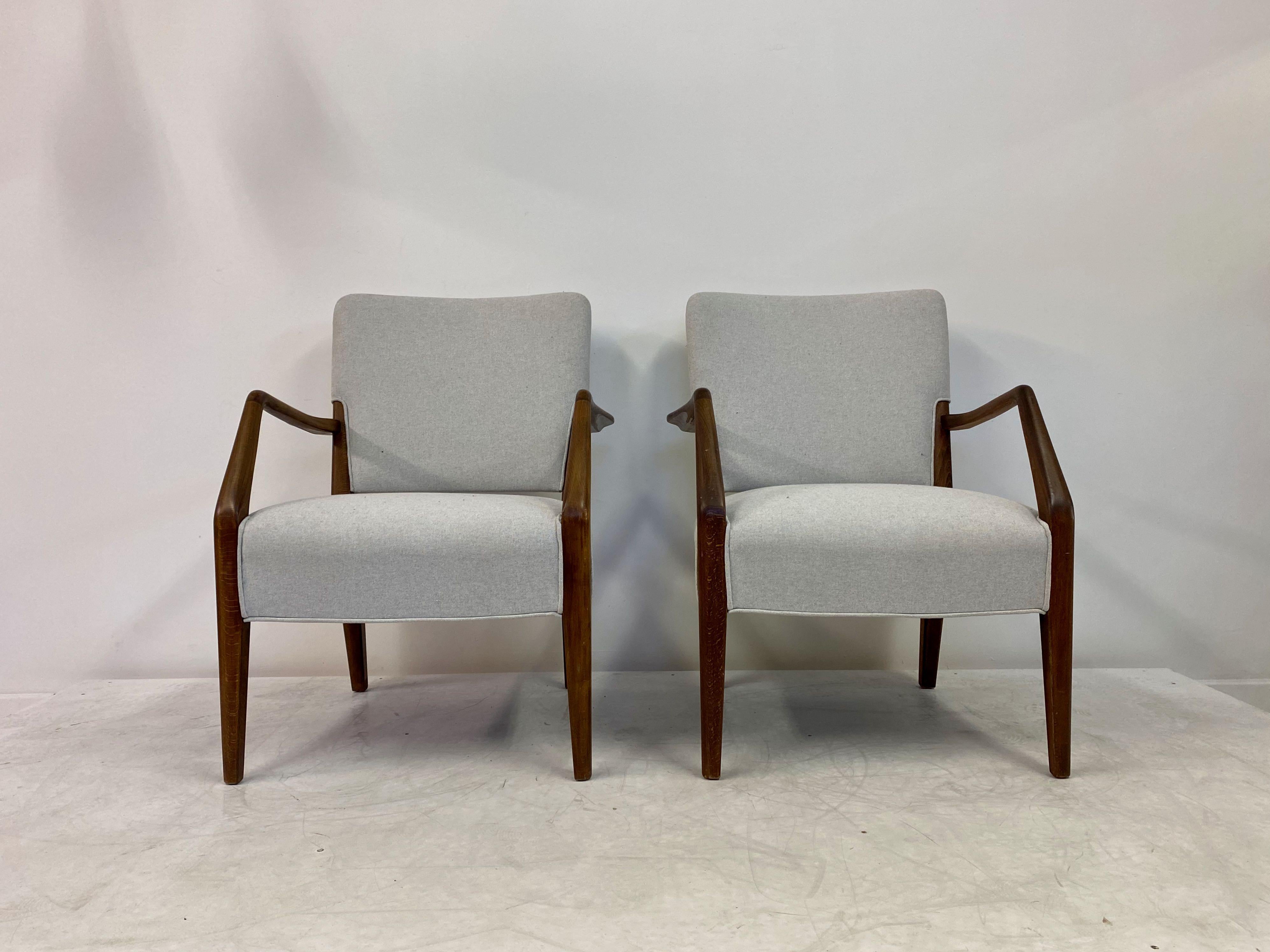 Pair of armchairs

By Peter Hvidt and Orla Molgaard-Nielsen

Manufactured by France & Daverkosen

Stained beech

New light grey wool upholstery

Mid 20th Century Danish

Seat height 43 cm