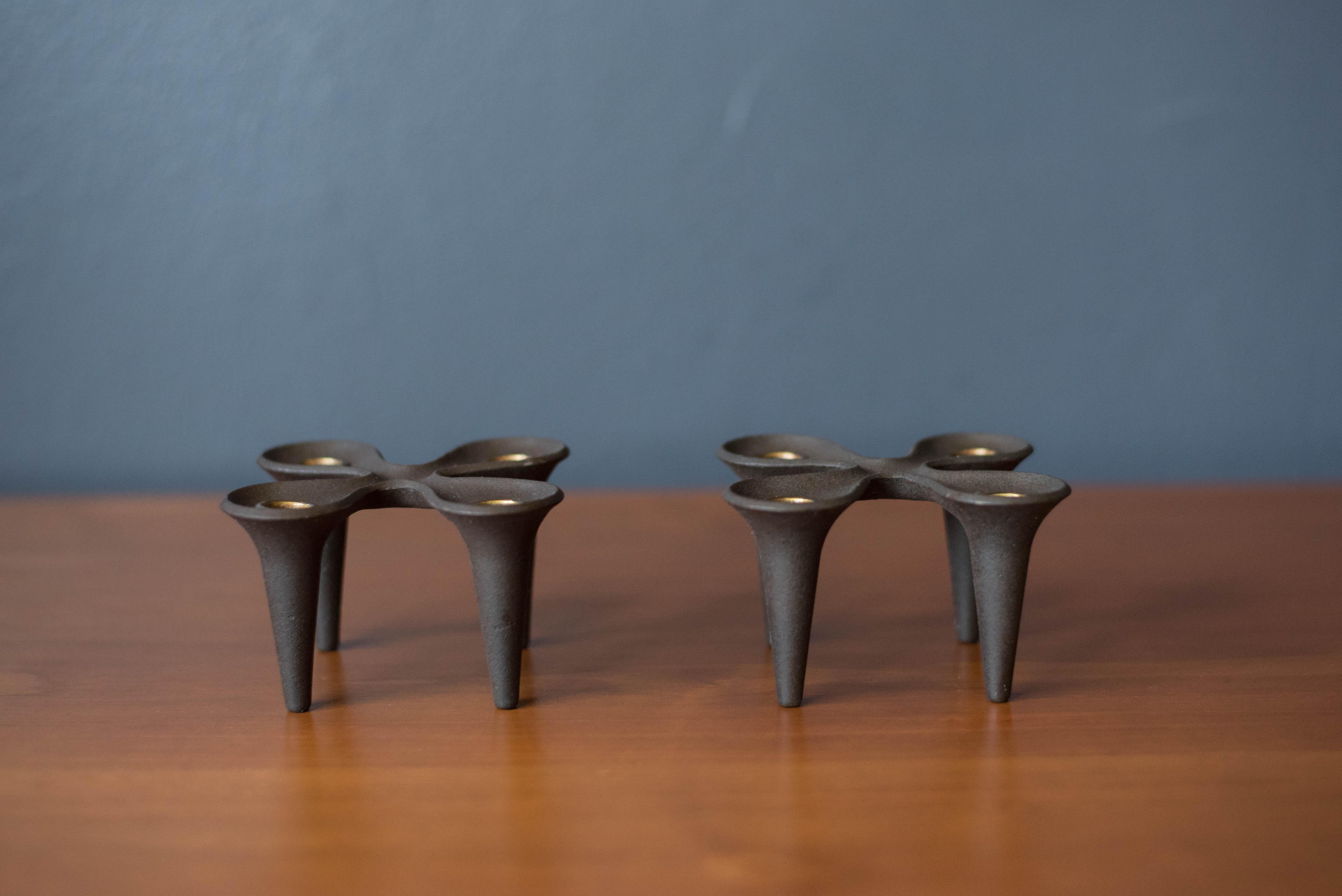 Vintage pair of black candleholders by Jens H. Quistgaard for Dansk Designs, Denmark. This set is made of heavy cast iron with brass inserts for taper candles. Price is for the pair.



Offered by Mid Century Maddist