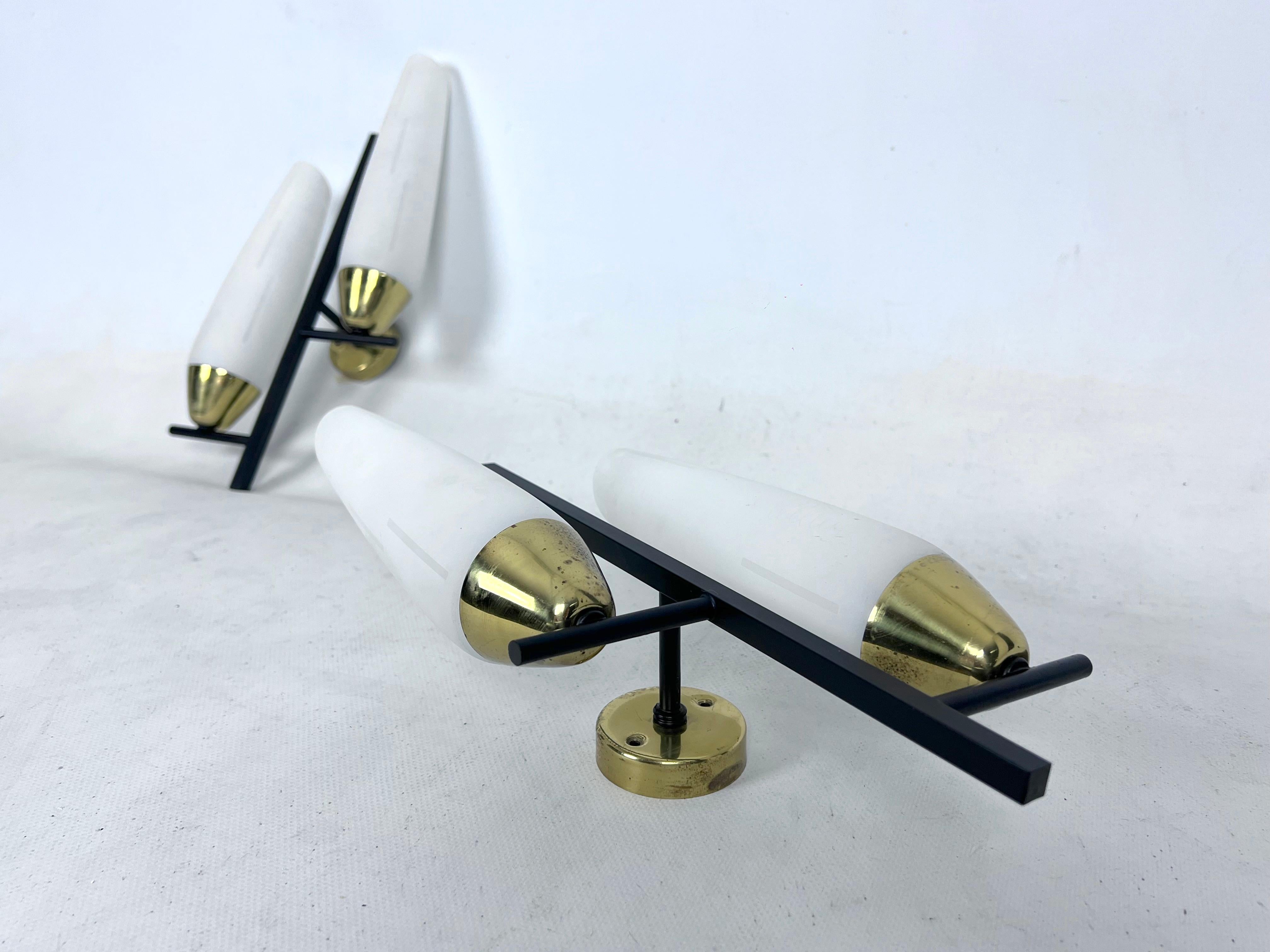 20th Century Mid-Century pair of double lights sconces in brass and opaline glass. Italy 1950 For Sale