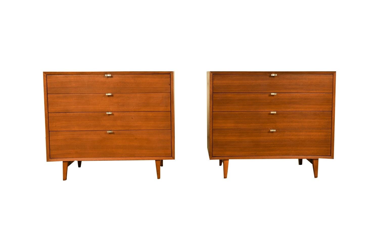 Remarkably iconic rare pair of walnut Mid-Century cabinets/ dressers by Florence Knoll, for Knoll inc., ca. 1960’s. A beautiful example of Mid-Century craftsmanship. Expertly crafted, these absolute jewels remain in clean vintage condition. Each