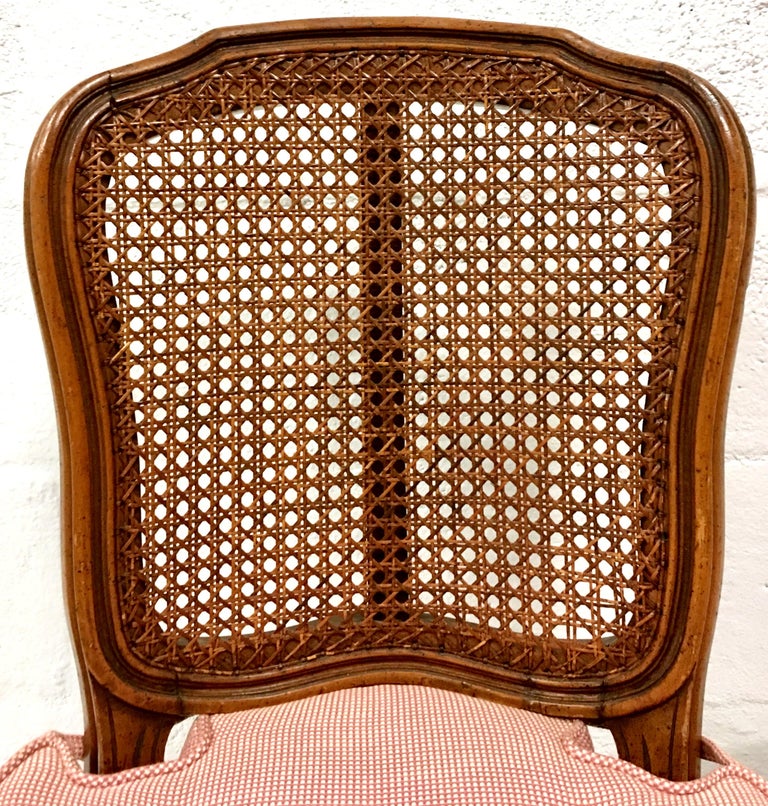 Midcentury Pair Of French Style Carved Wood and Cane Chairs For Sale at