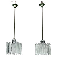 Mid-Century pair of ice glass and chrome pendants by Kalmar. Austria 1970s