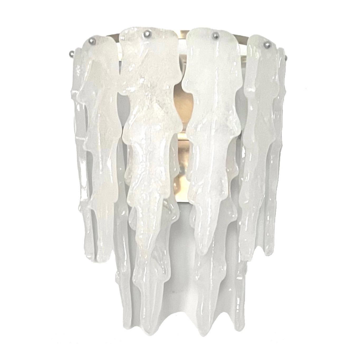 Unique, beauty and large Pair of Italian white Murano glass wall sconces from 1970s.
These wall sconces were made during the 1970s in Italy for the Venice Company 