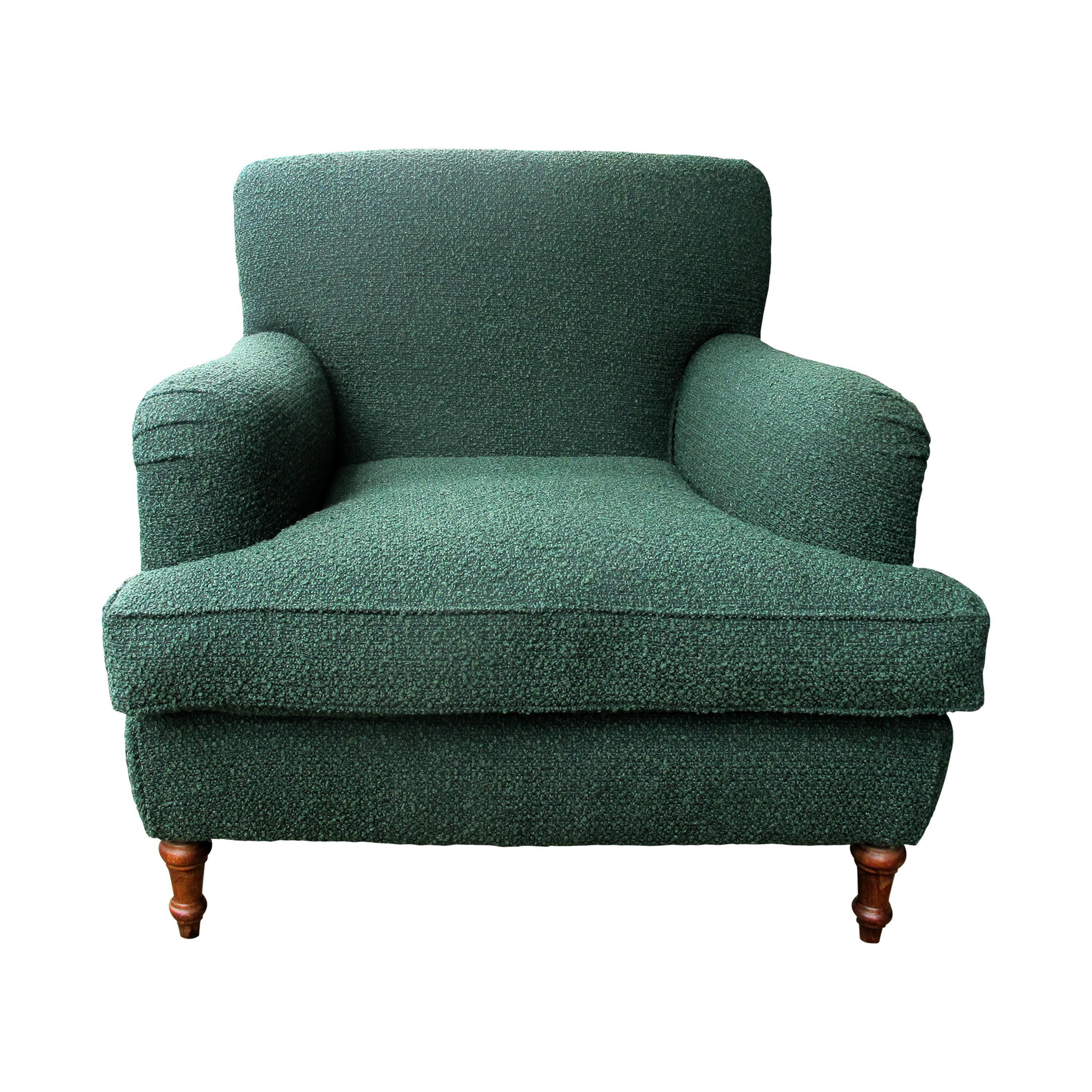 A pair of very comfortable Swedish armchairs circa 1950s/60s. These armchairs boast a generous size and are newly upholstered in soft green boucle fabric. These armchairs are supported by oak-turned wooden legs at the front adding a classic touch to