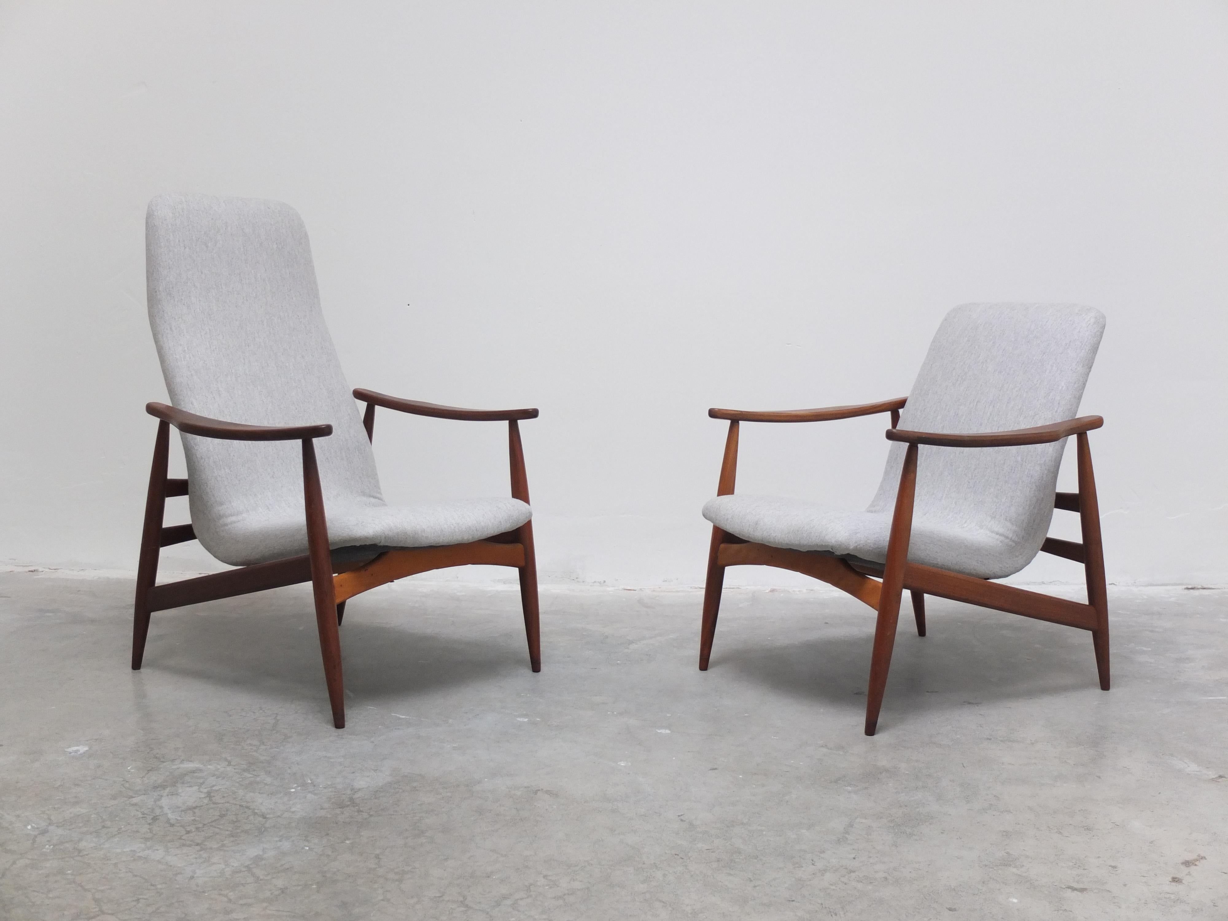 Beautiful pair of lounge chairs consisting of a his and hers model with a taller and lower backrest. Probably designed by Louis Van Teeffelen for Wébé but not documented so quite a rare pair. They have organic teak frames with a nice double joint on