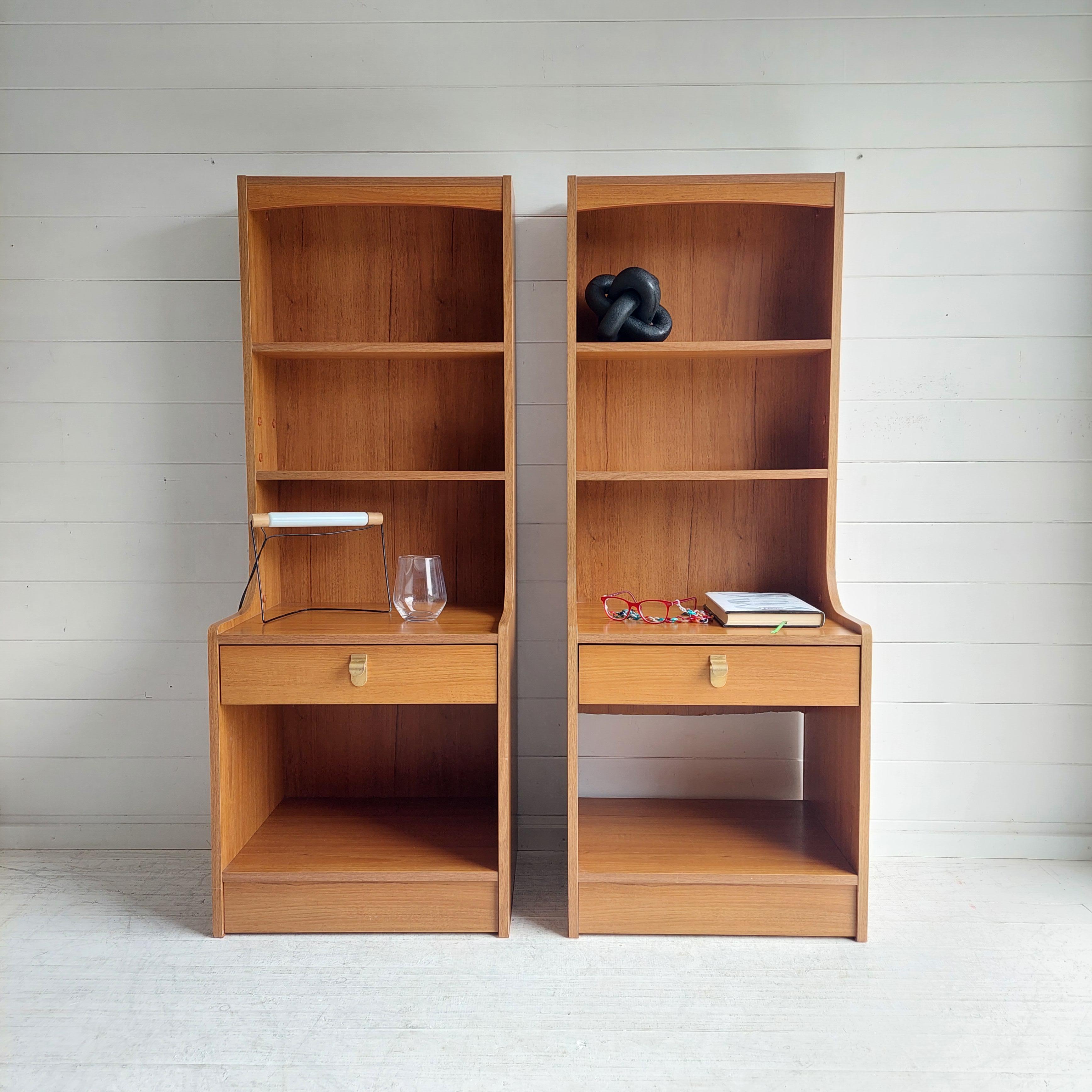 Pair of mid century Schreiber bedside tables. 
An original vintage 1970's units by Schreiber, finished in a teak effect laminated wood with solid brass handles 

These units are perfect for anyone who wants to add a touch of class to their