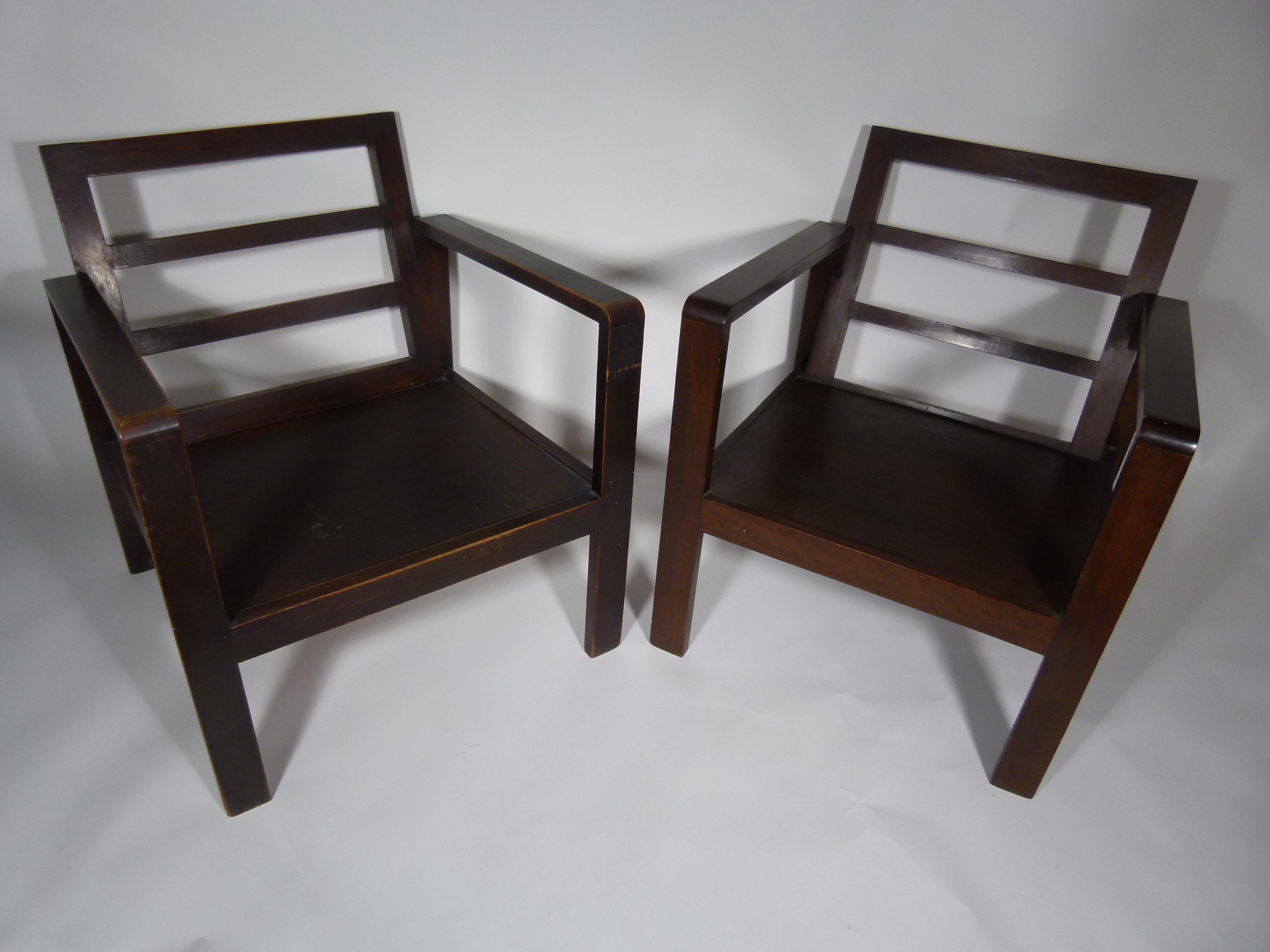 Midcentury pair of walnut armchairs from Spain. The clean lines and Minimalist and gentle design of the chairs are typically from the 1950s. A style that is idolized even today.