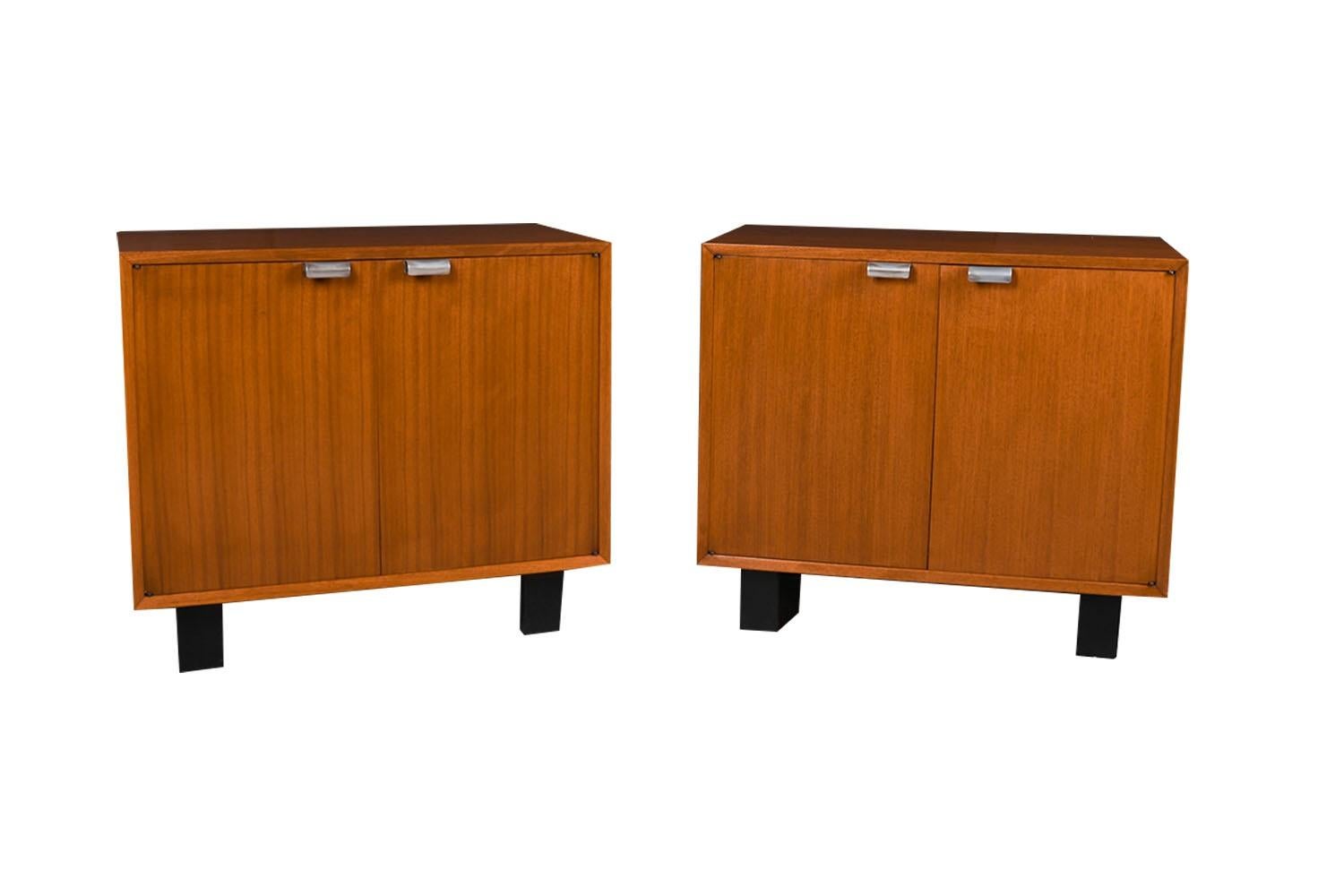 Remarkably Iconic rare pair of double door cabinets designed by George Nelson for the Herman Miller, Primavera line circa 1950s. Iconic piece resulting from the collaboration of these two MCM Masters! Often referred to as the Primavera Line, part of