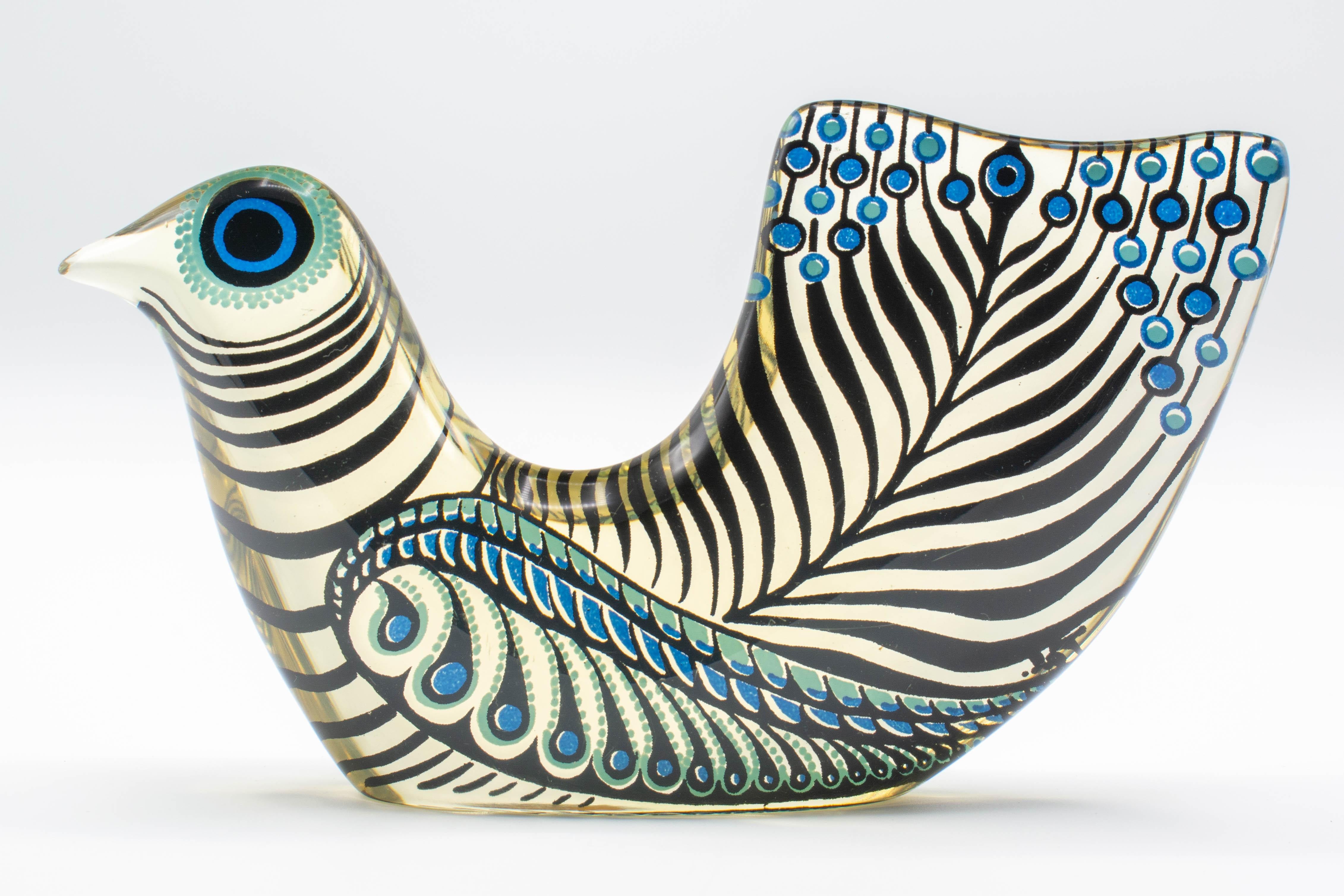 A Mid-Century Modern Lucite Op Art blue, turquoise and black bird designed by Abraham Palatnik. Abraham Palatnik (born in 1928) is a Brazilian artist and inventor whose innovations include kinechromatic art. Part of the Artemis Collection that