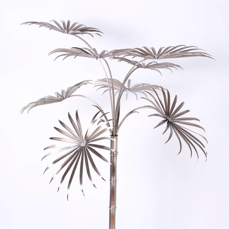Midcentury palm tree sculpture crafted in stainless steel.