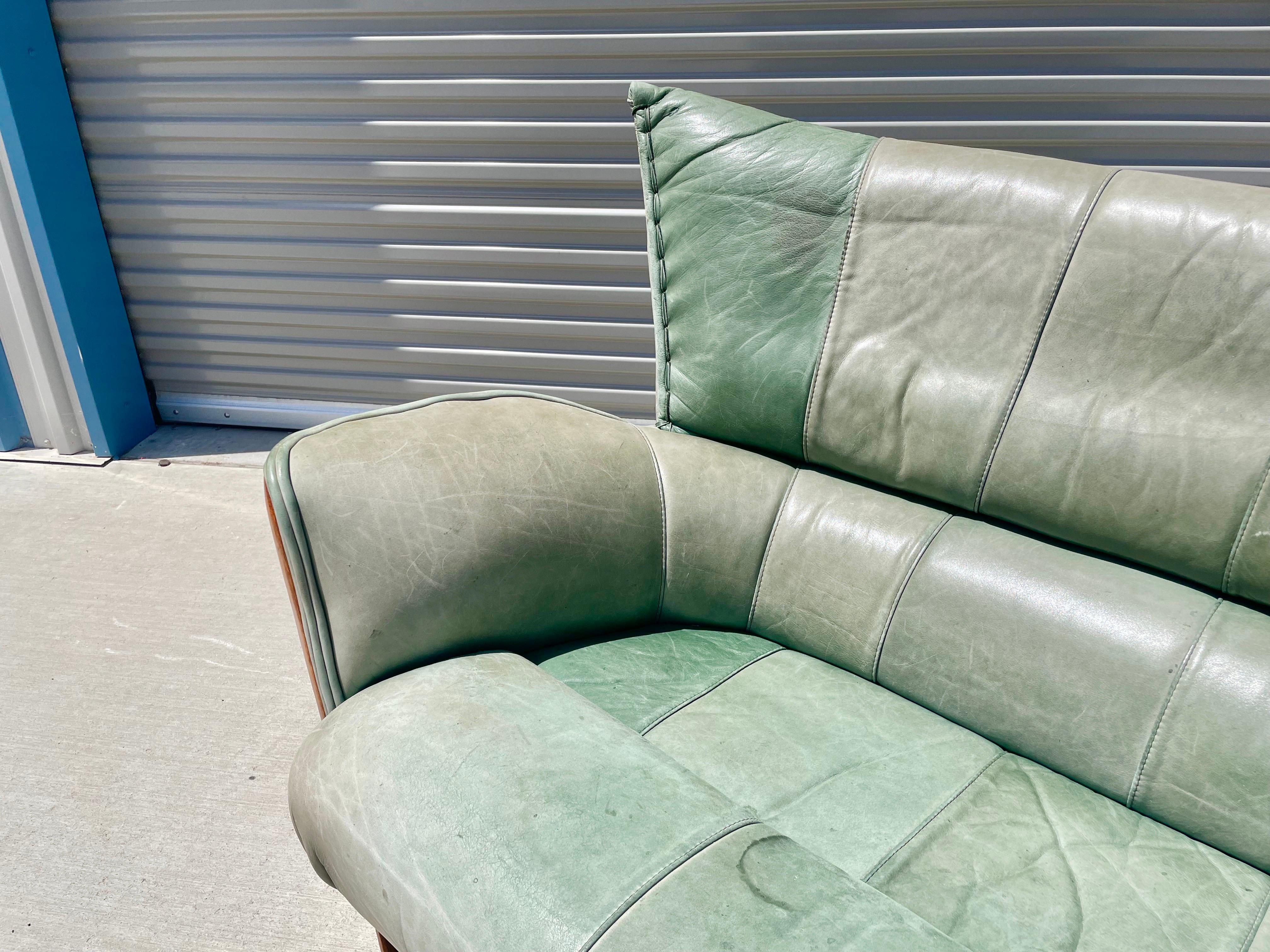 green leather sofa