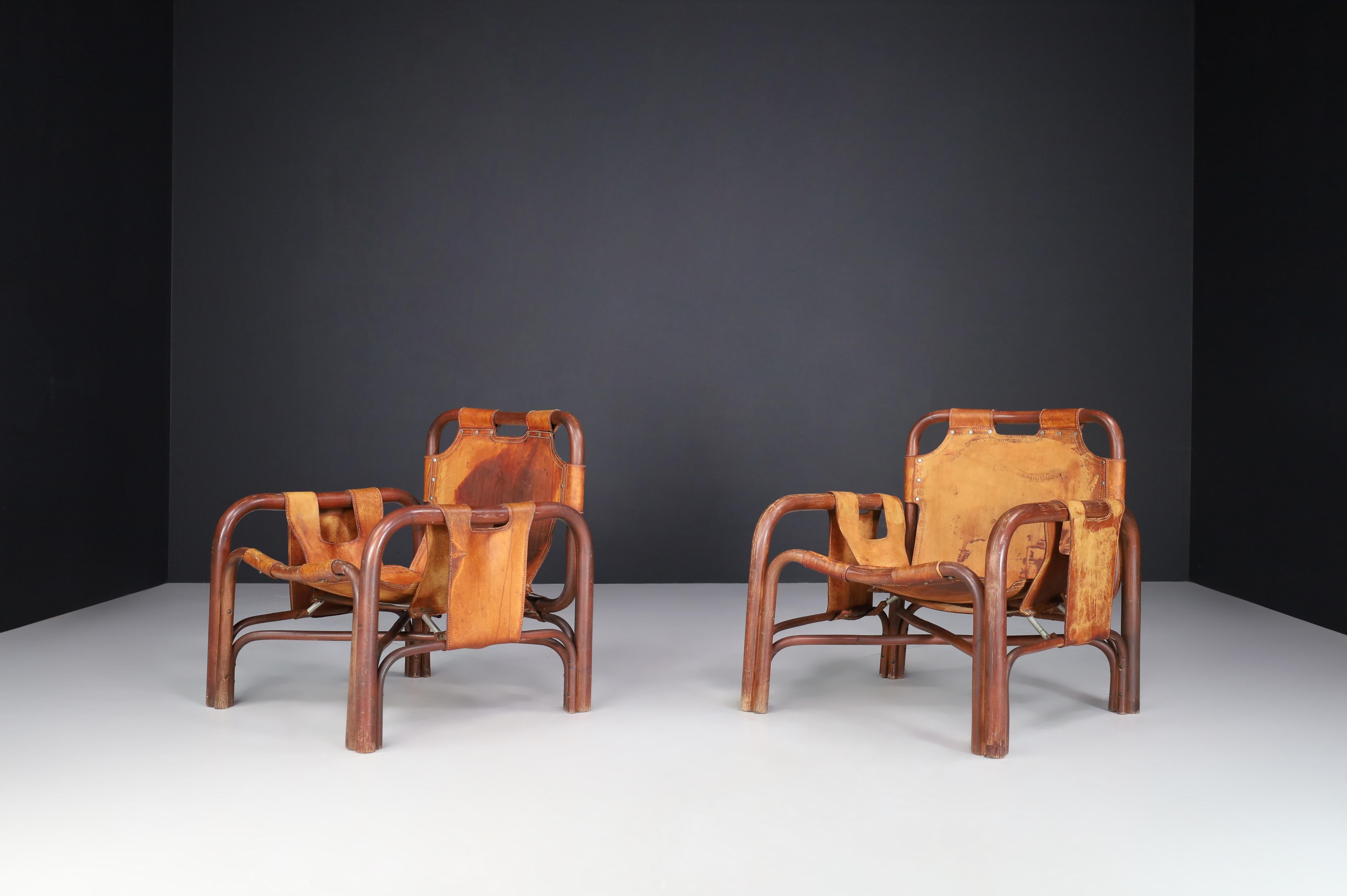 Mid-Century Modern Mid-Century Patinated Leather and Rattan Lounge Chairs by Tito Agnoli Italy 1960 For Sale
