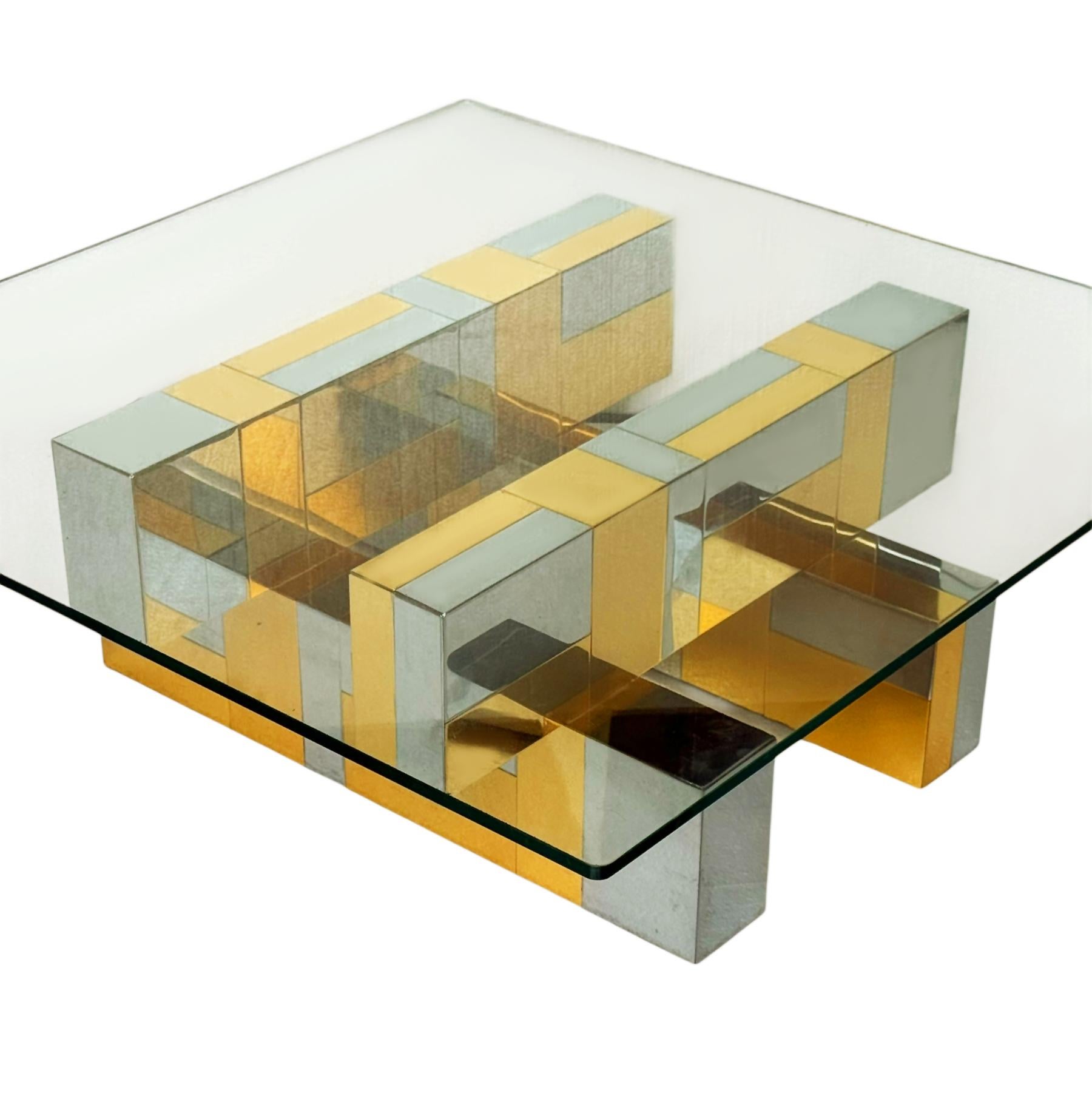 A stunning Cityscape design coffee table by Paul Evans for Directional. It features a chrome & brass patchwork design base with a heavy glass top. In very good vintage condition. 