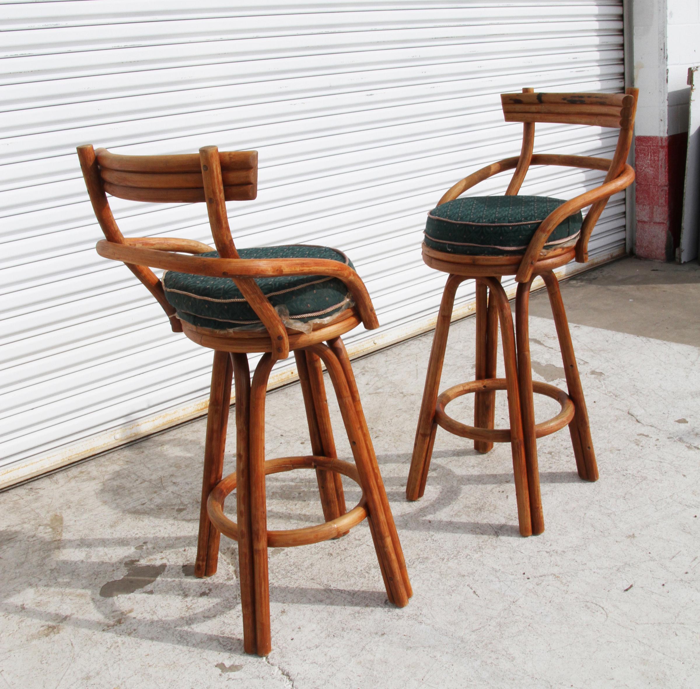 Paul Frankl Style Stools Faux Bamboo

3 Strand backs with swivel. Reupholstery recommended.

