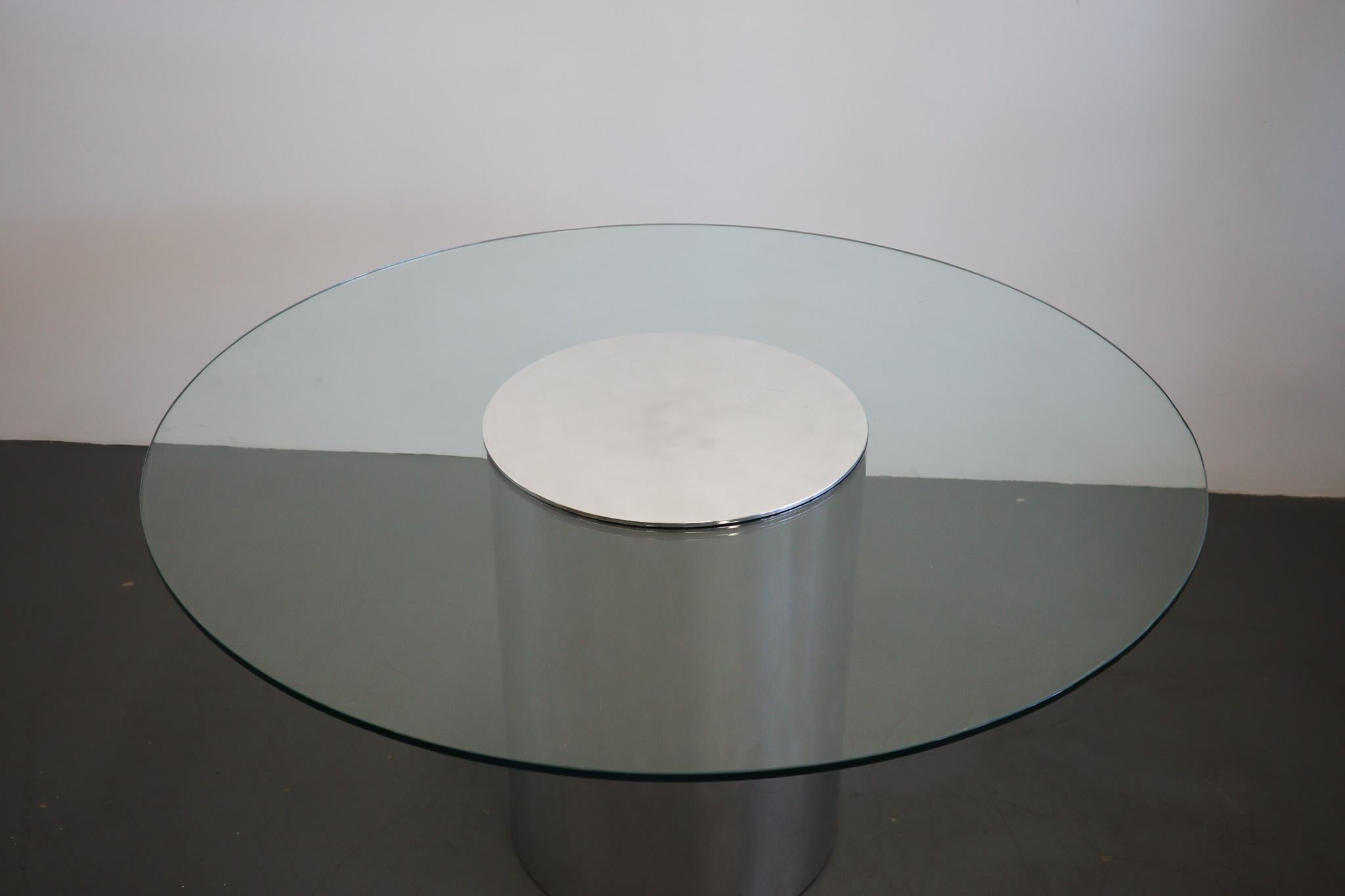 Stunning aluminum base with a delicately placed solid aluminum center piece. Recently polished to give it a clean mirror finish. Paul Mayen was a Spanish architect and industrial designer known for his work at Frank Lloyd Wrights Fallingwater. His