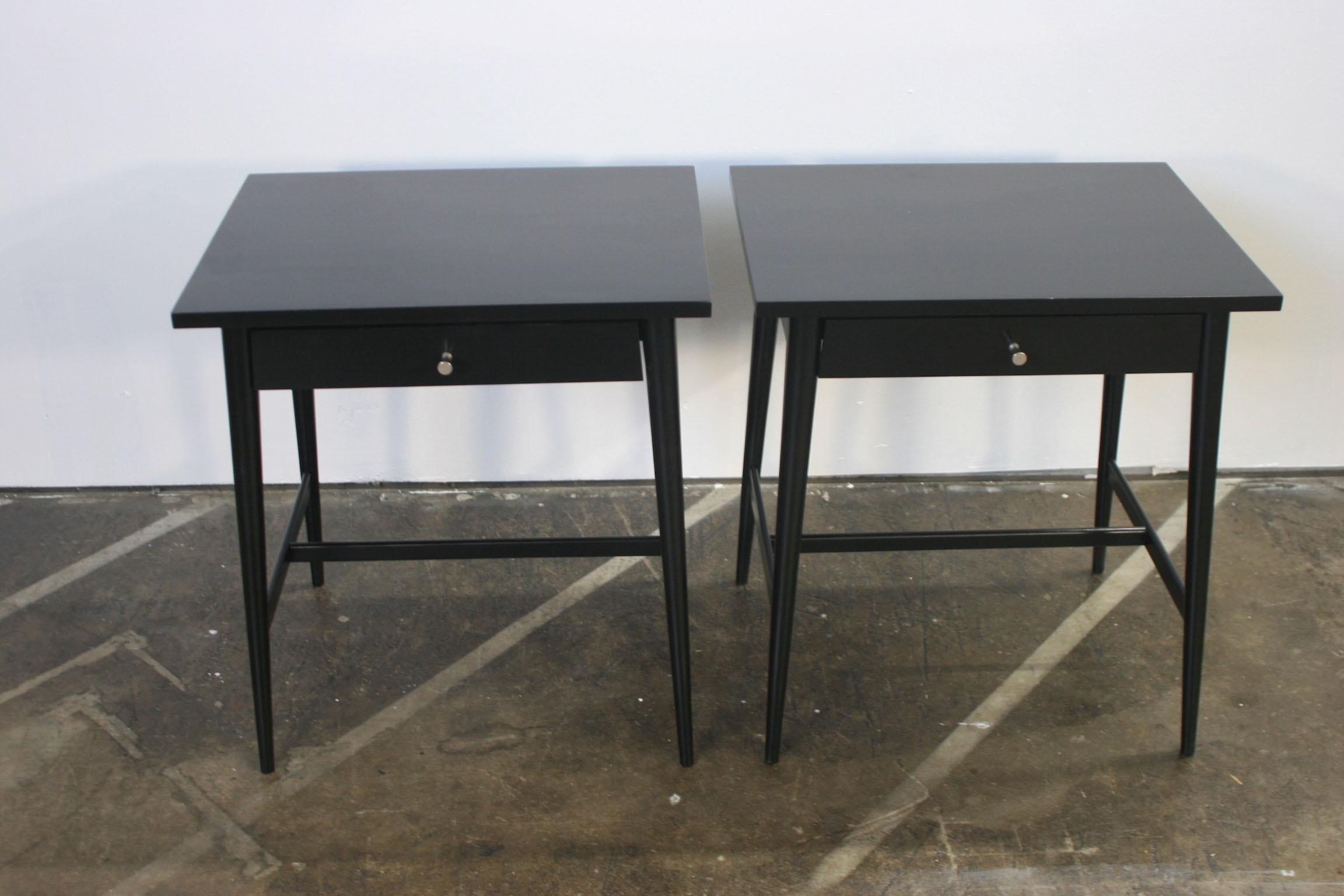 Beautiful pair of Paul McCobb Planner Group #1586 maple nightstands lamp tables single drawer Planner Group nickel knobs Minimalist refinished in Black lacquer - Professionally sprayed. Very delicate designed pair of nightstands with Tapered legs -
