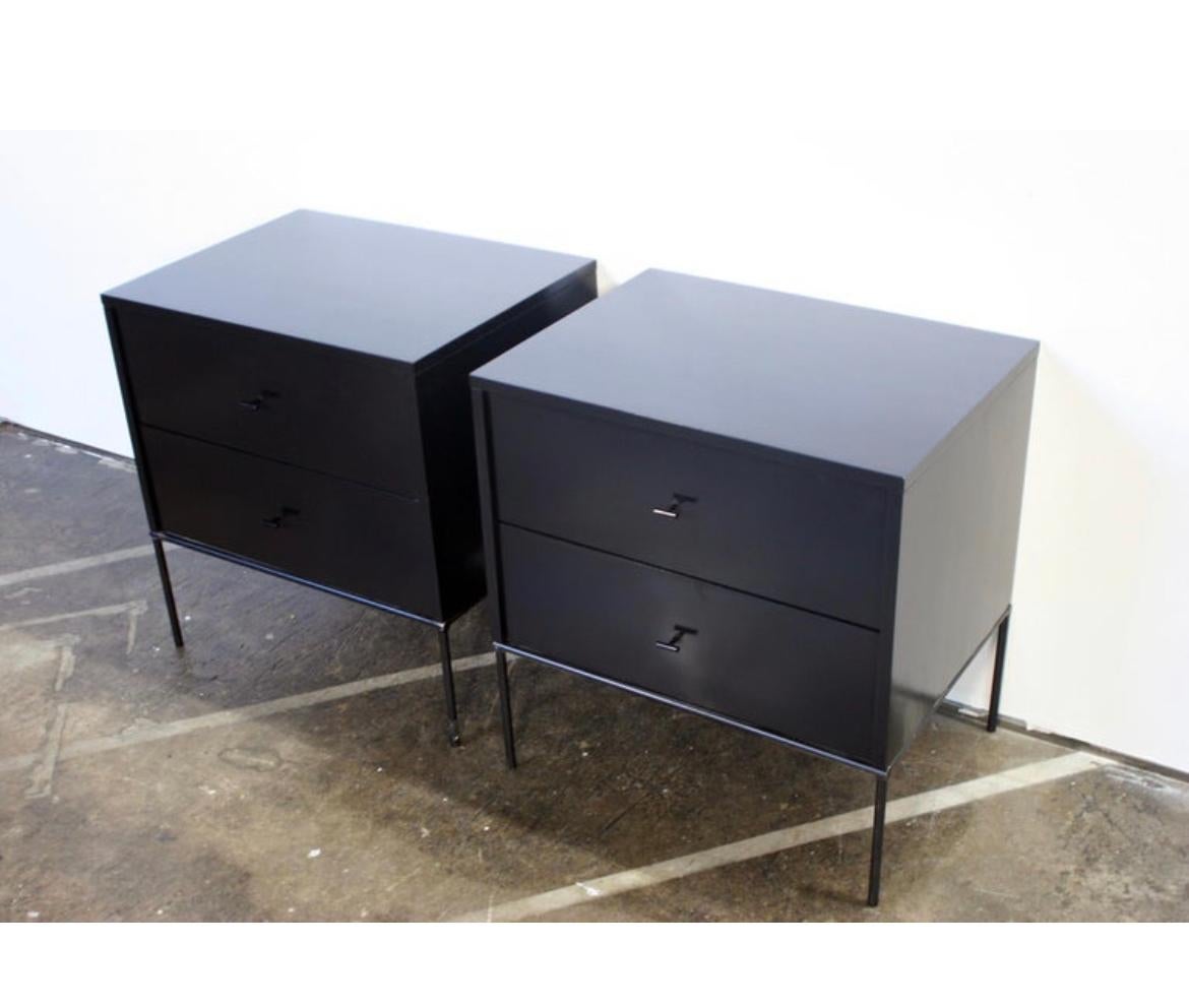 Beautiful pair of Paul McCobb 1950s #1503 maple nightstands end tables double-drawer planner group. Black T pull knobs. Refinished in black lacquer. Very modern designed pair of nightstands with Iron Base with 4 legs. all solid maple. You are buying