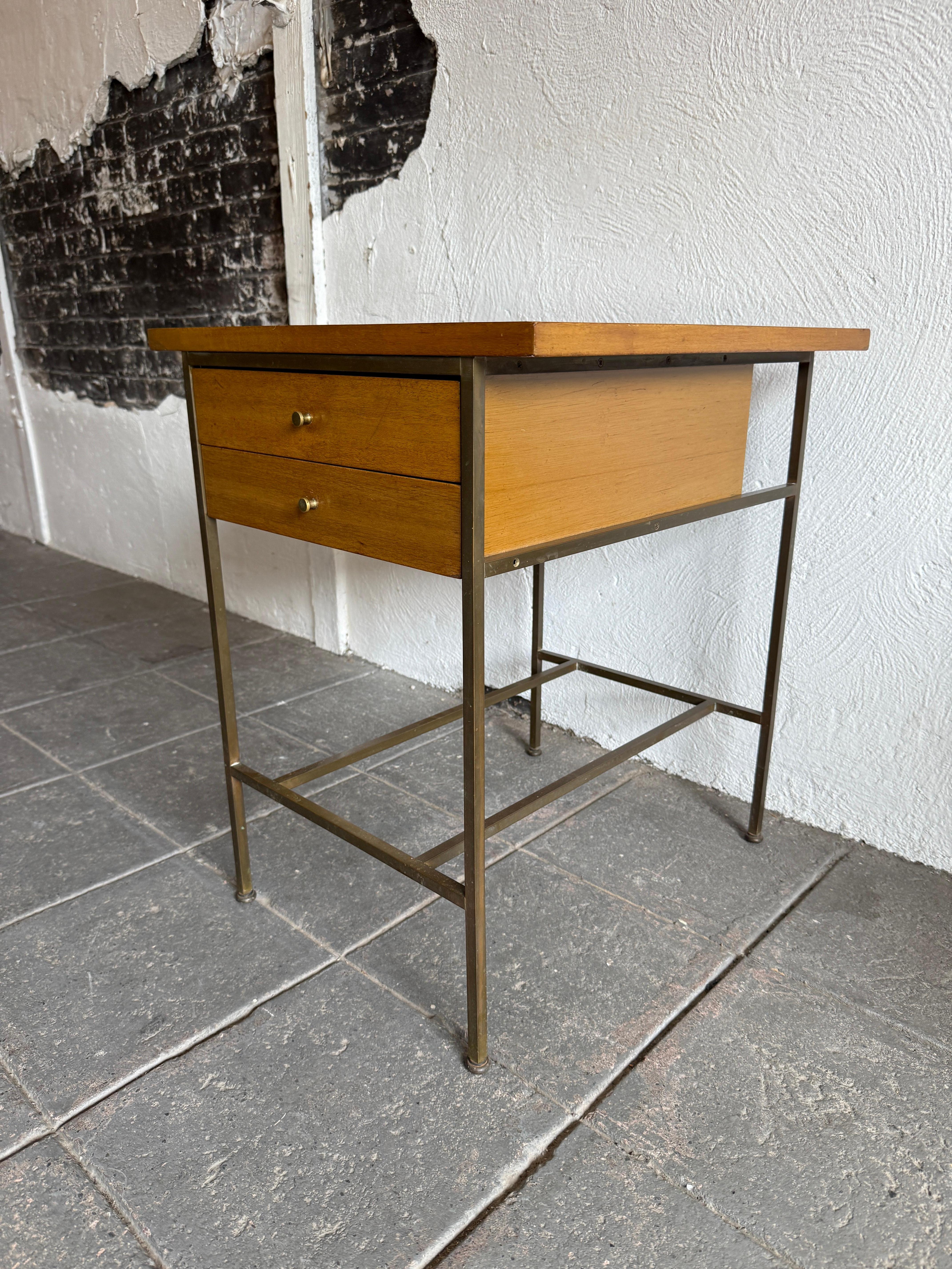 Beautiful Paul McCobb 1960s Production brass nightstand end tables with 2 drawers and brass frame. Solid Brass knobs - Original Vintage Condition. Very modern designed nightstand. You are buying (1) nightstand only. Labeled Paul McCobb Calvin