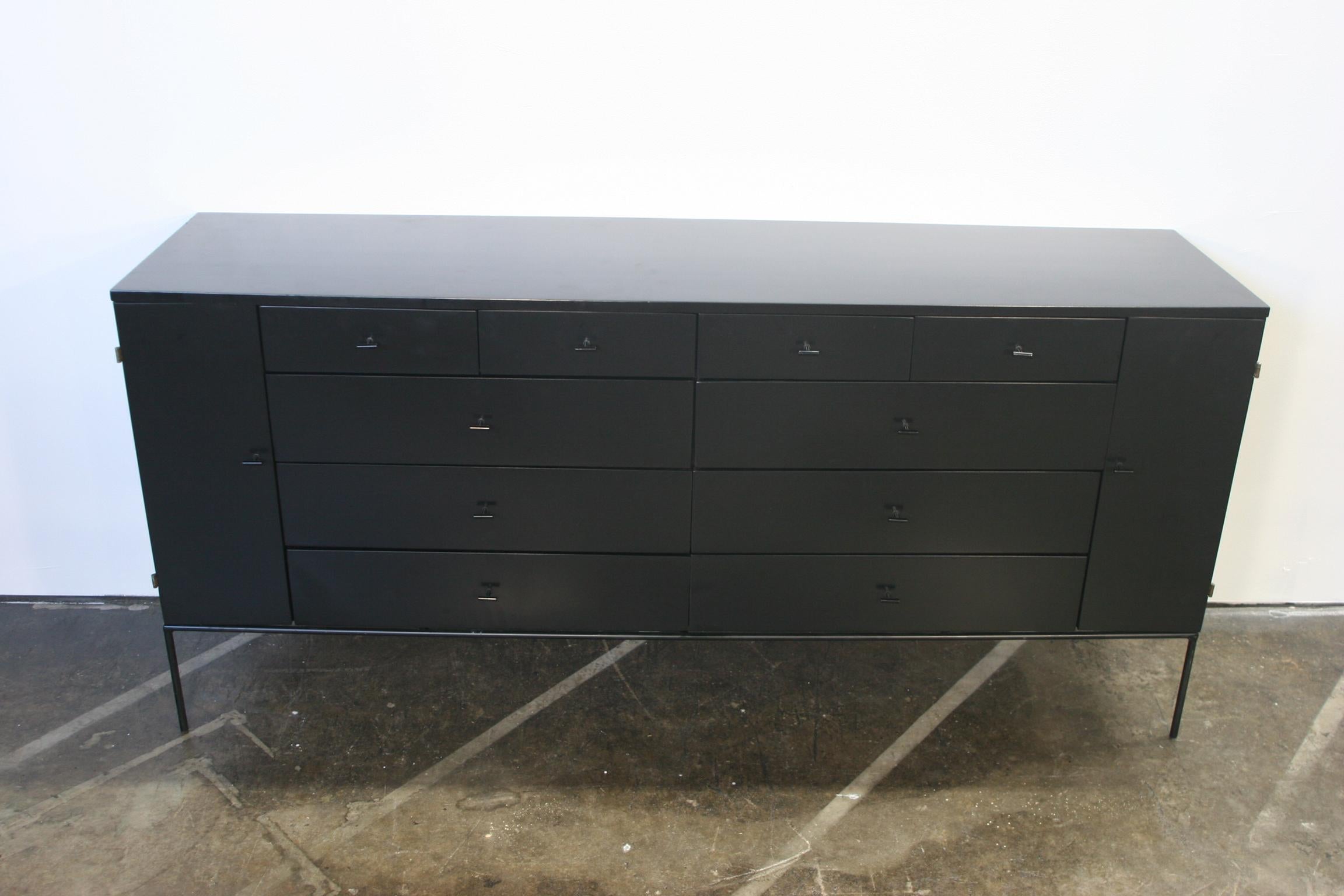 Midcentury American designer Paul Mccobb 20-drawer dresser or credenza - Planner Group line #1510 rare - all black lacquer finish steel T pull knobs. Newly professionally sprayed lacquer black - original all solid maple construction - iron base with