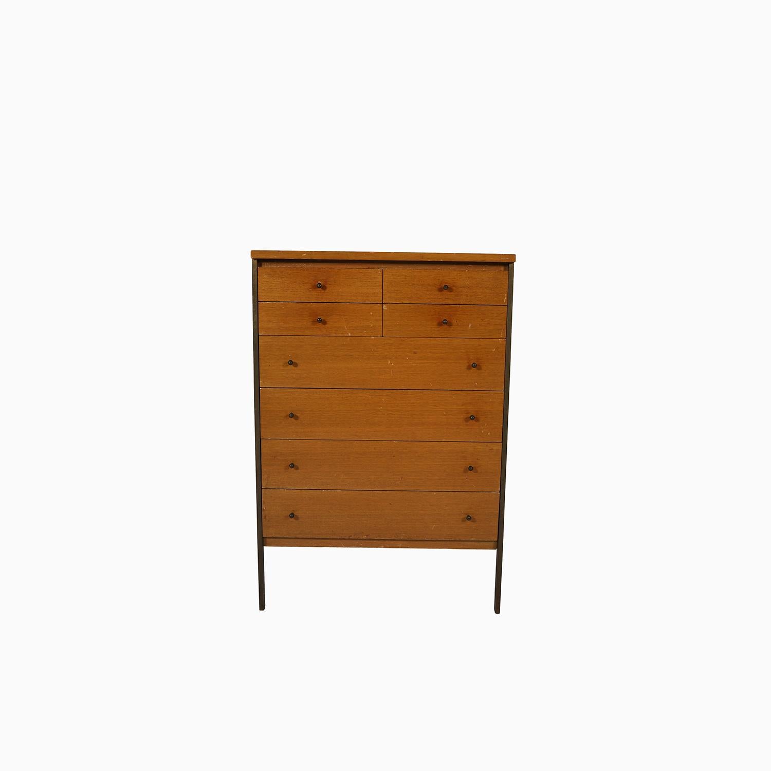 A rare design by American mid century designer Paul McCobb for H. Sacks & Sons. Mahogany cabinet with solid brass legs and perfectly proportioned brass drawer pulls. An excellent entry piece or use in the bedroom for jewelry. 

Professional, skilled
