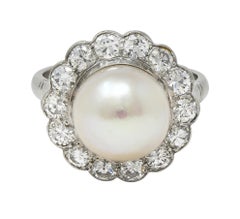 Anello aureola vintage in platino con diamante e perla di metà secolo