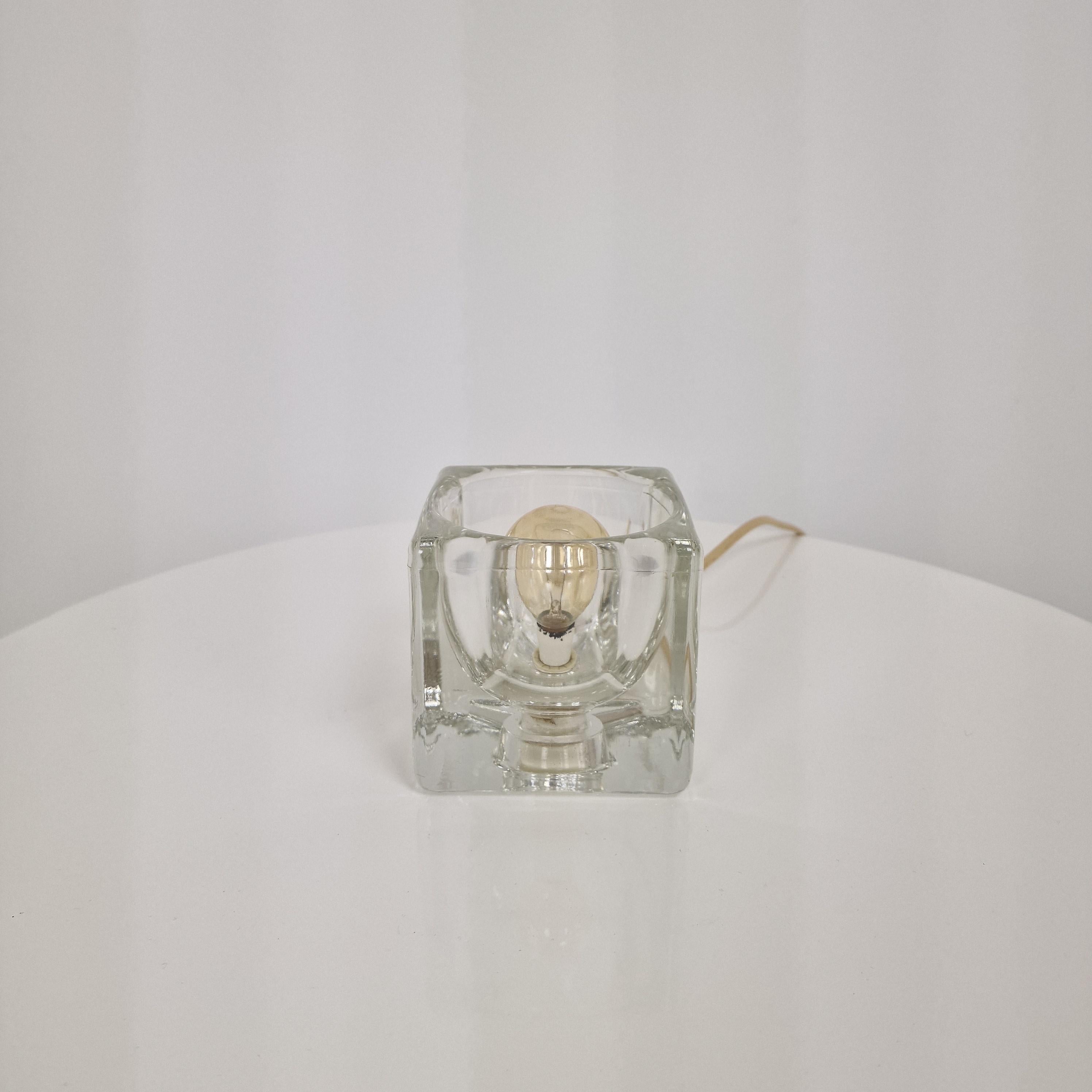 Add a touch of vintage elegance to your home with this stunning Peill + Putzler table lamp, a true design classic from the 1970s. 

Known for their exceptional craftsmanship, Peill + Putzler pieces are highly sought after by collectors and interior
