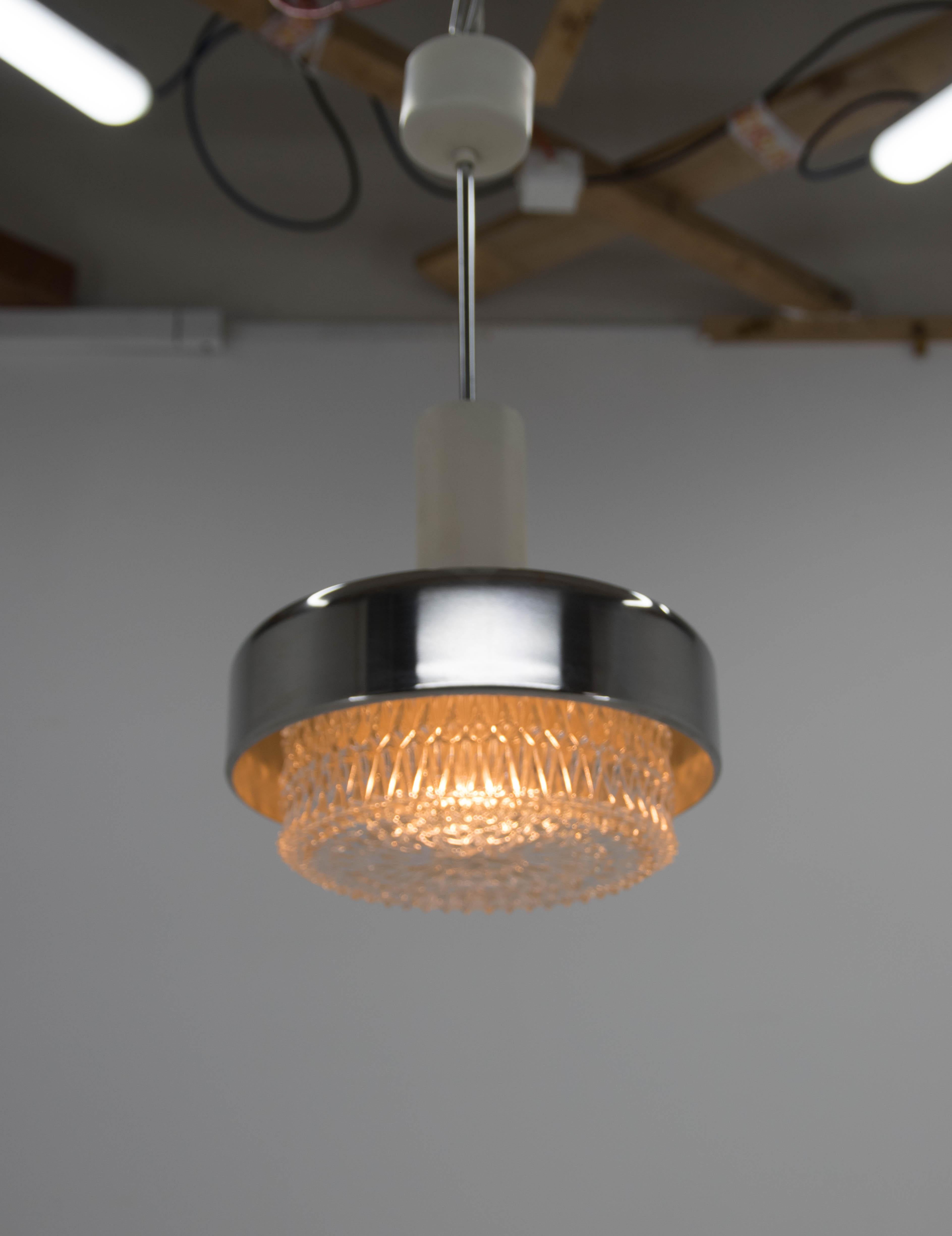 Steel and glass pendant by Napako. Very good original condition. rewired:
1x60W, E25-E27 bulb
US wiring compatible.