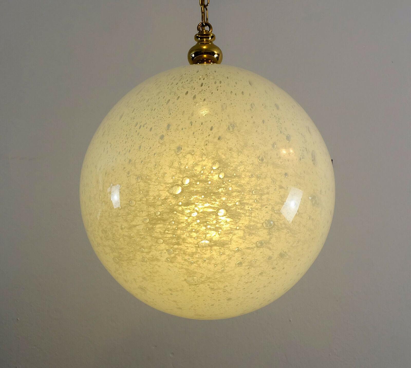 Very beautiful and elegant 1960s 1970s pendant light. Manufactured by Doria-Leuchten. The shade is made of white glass with bubble structure, like soap foam, which can be seen on the detail picture. The base and the chain are made of brass. For 1