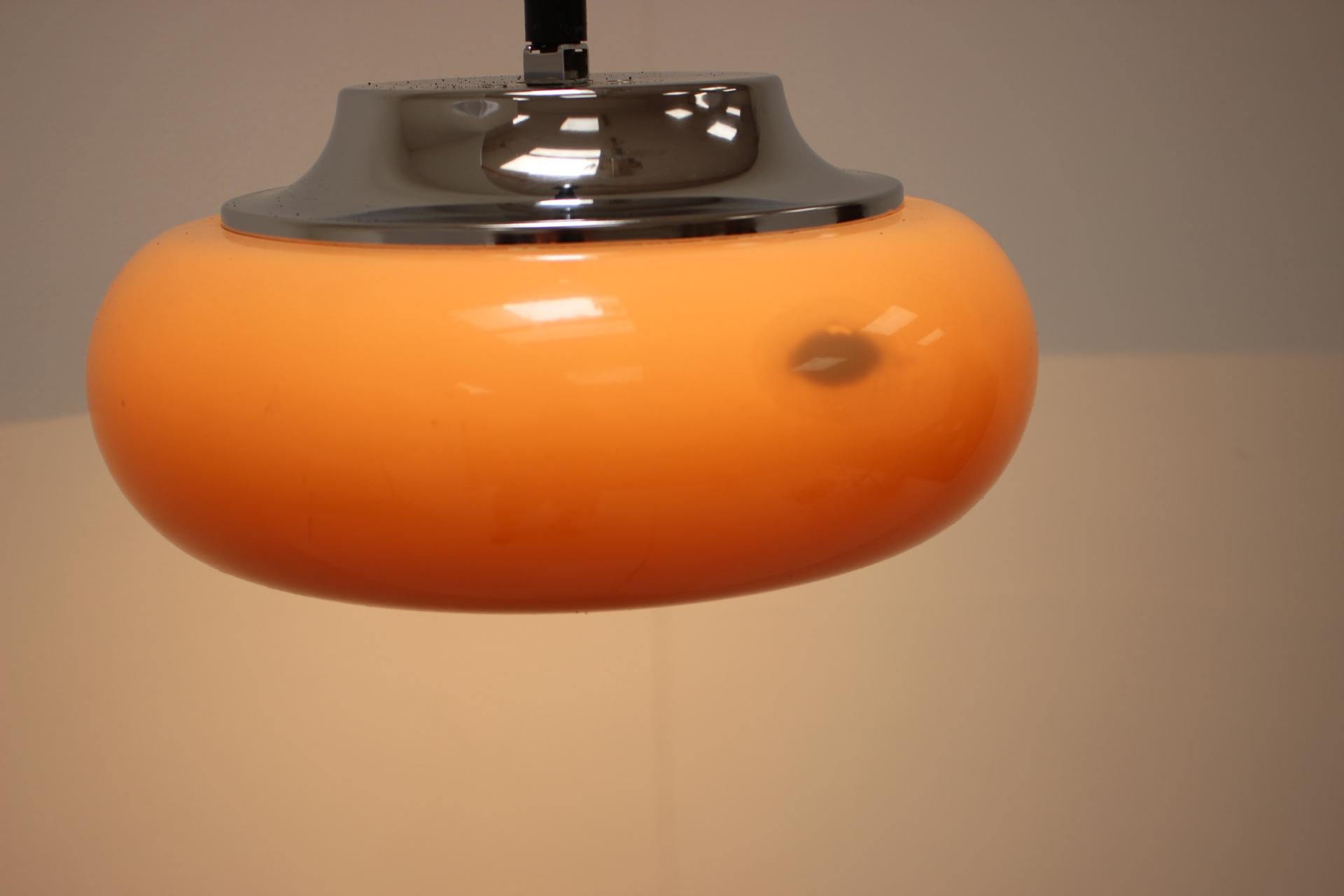 Big pendant by Meblo, Italy, 1970's.
Beige-orange plastic shade, in good condition overall, only some minor scratches from daily use.
Fully functional, repolished.




  