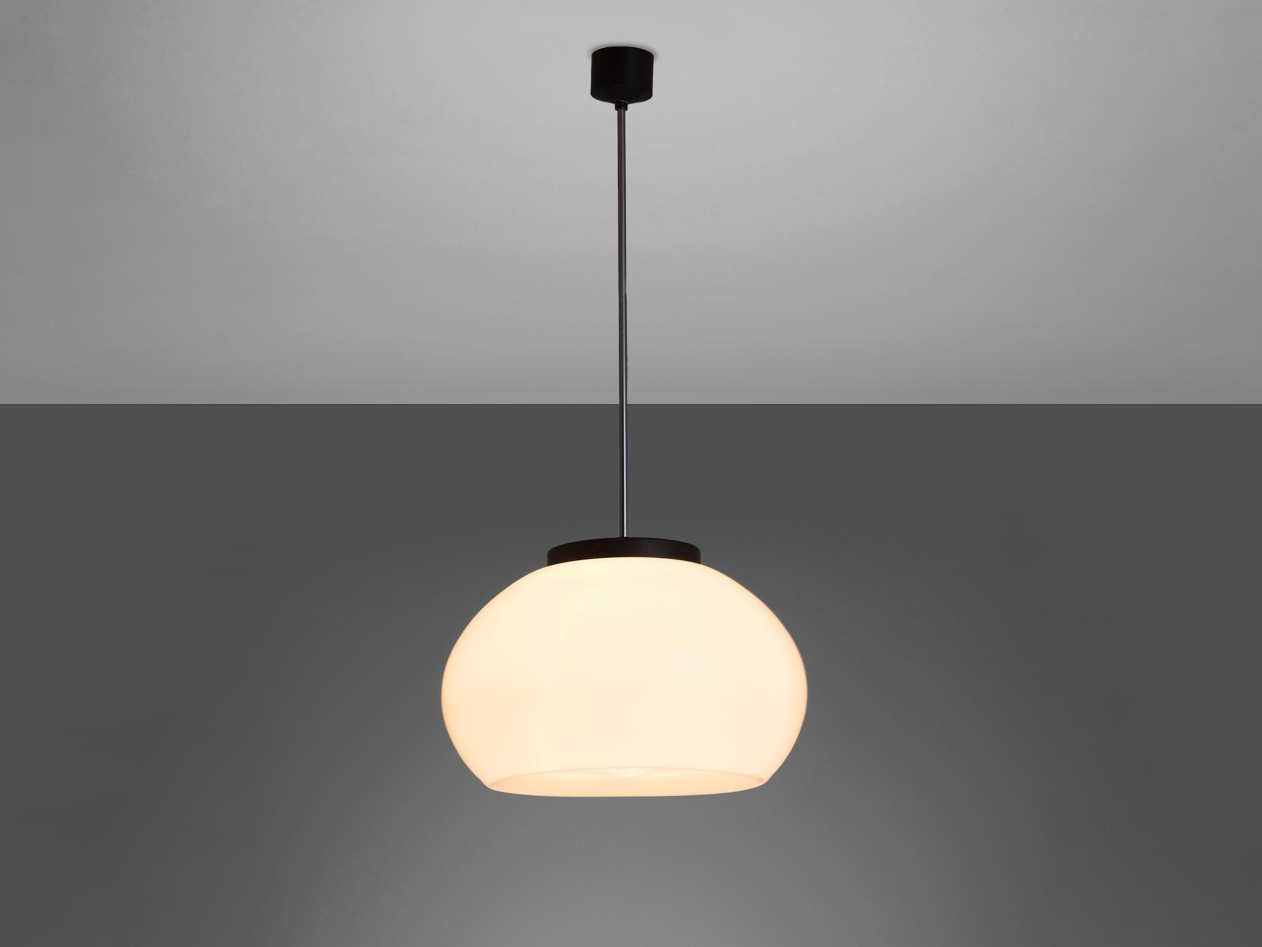 Pendants, glass, metal, Europe, 1970s.

This simple, round shape is very streamlined and organically shaped. The pendants are typically midcentury modern. The glass absorbs the light in a sophisticated way creating a wonderful, atmospheric light