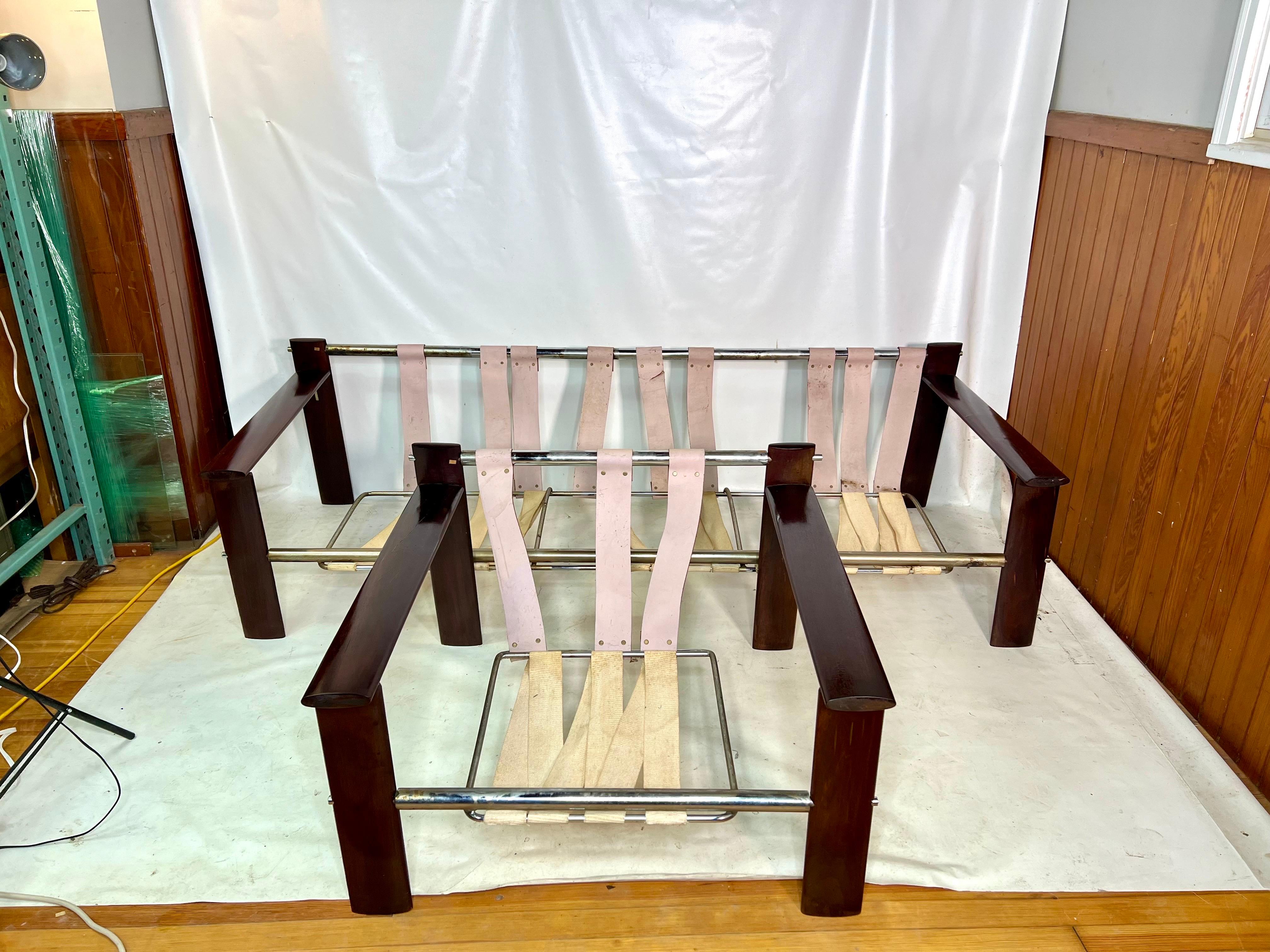 This is a very rare opportunity to buy the couch and chair for a fraction of the price because the set is missing the original cushions. The frames are complete with original strapping. 

Lounge chair measurements: 
35” W 30.75” D 24” h