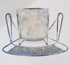 Mid-Century perforated metal armchair from the 1950s