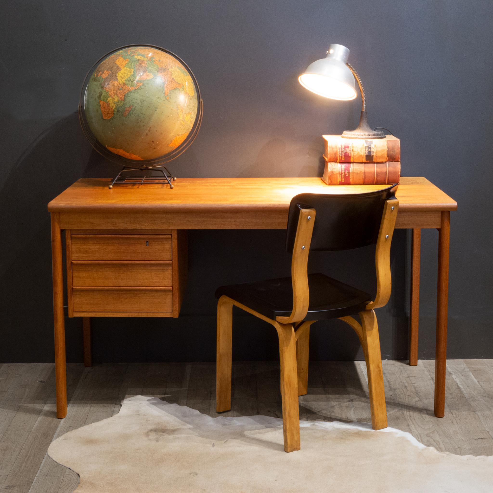 Aabout

Vintage Mid-Century Modern Danish teak Peter Lovig Nielson Dansk desk designed by Jens Quistgaard. This Danish design desk has 3 drawers on the lower left. The top teak desk surface slides to the left and right to reveal a hidden storage