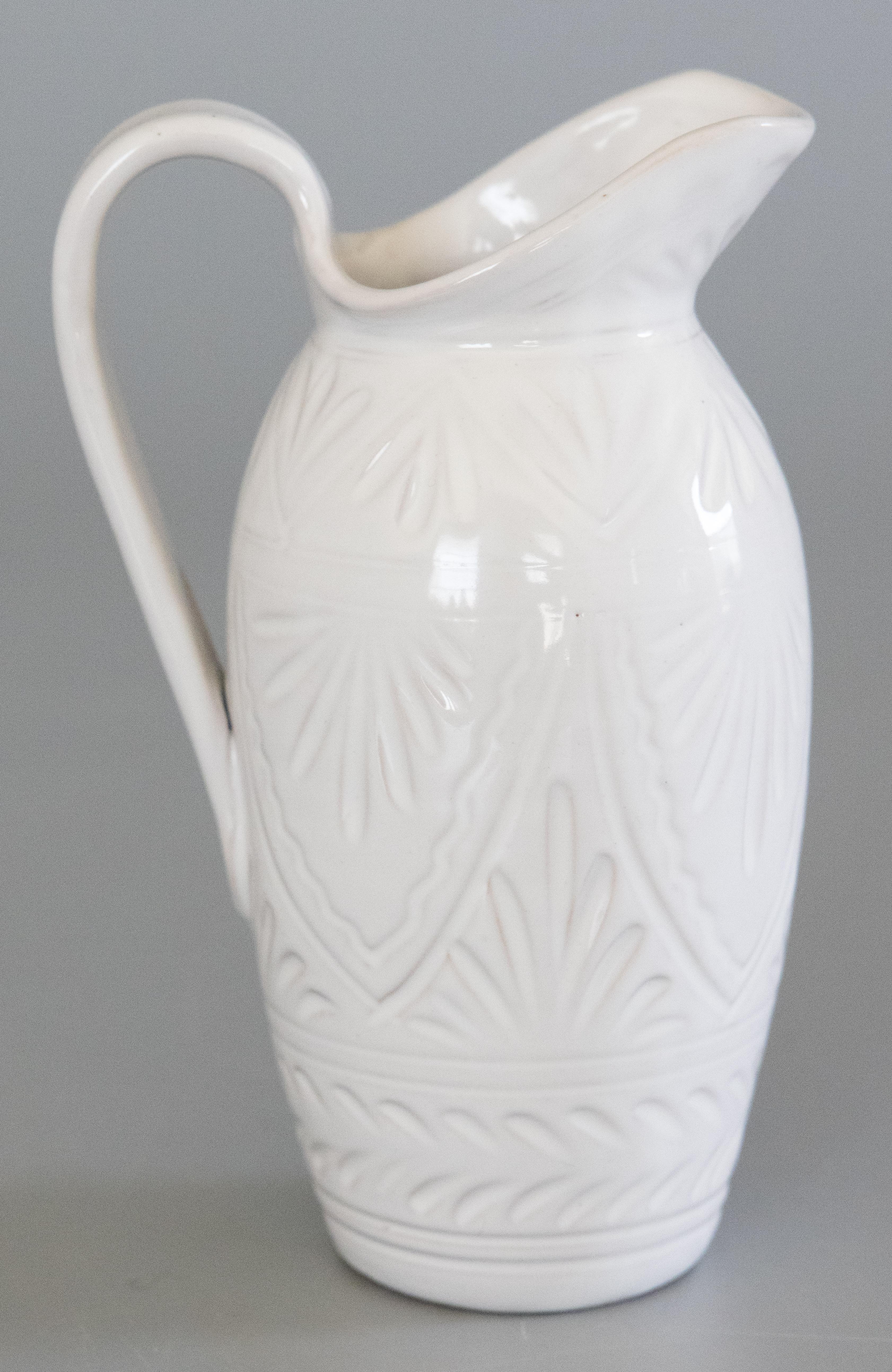 A lovely vintage petite Italian white glazed terracotta pitcher. Marked 