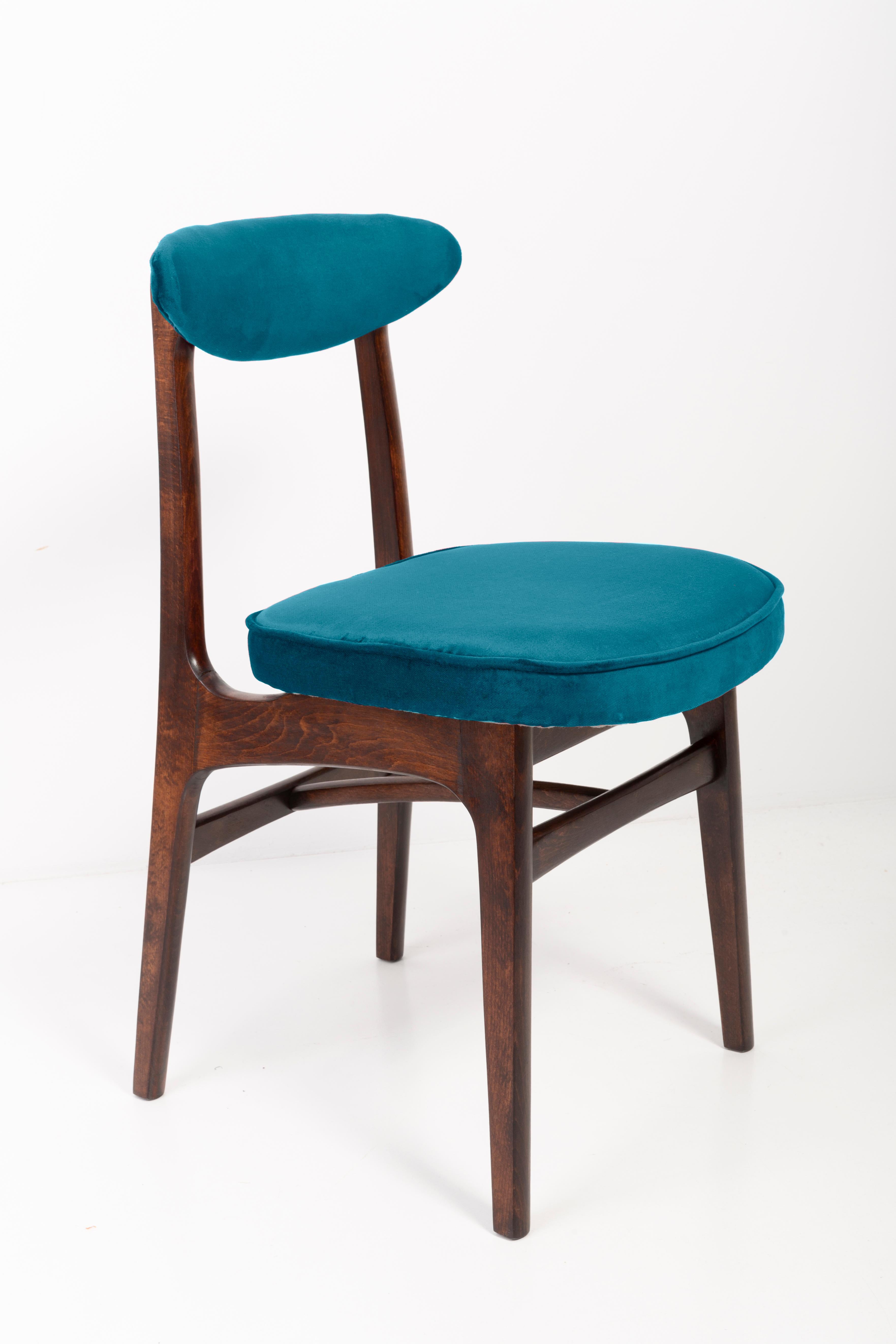 Light form nice vintage chair designed by Prof. Rajmund Halas. It has been made of beechwood. Chair is after undergone a complete upholstery renovation, the woodwork has been refreshed. Seats and backs were dressed in a petrol blue (color 973),