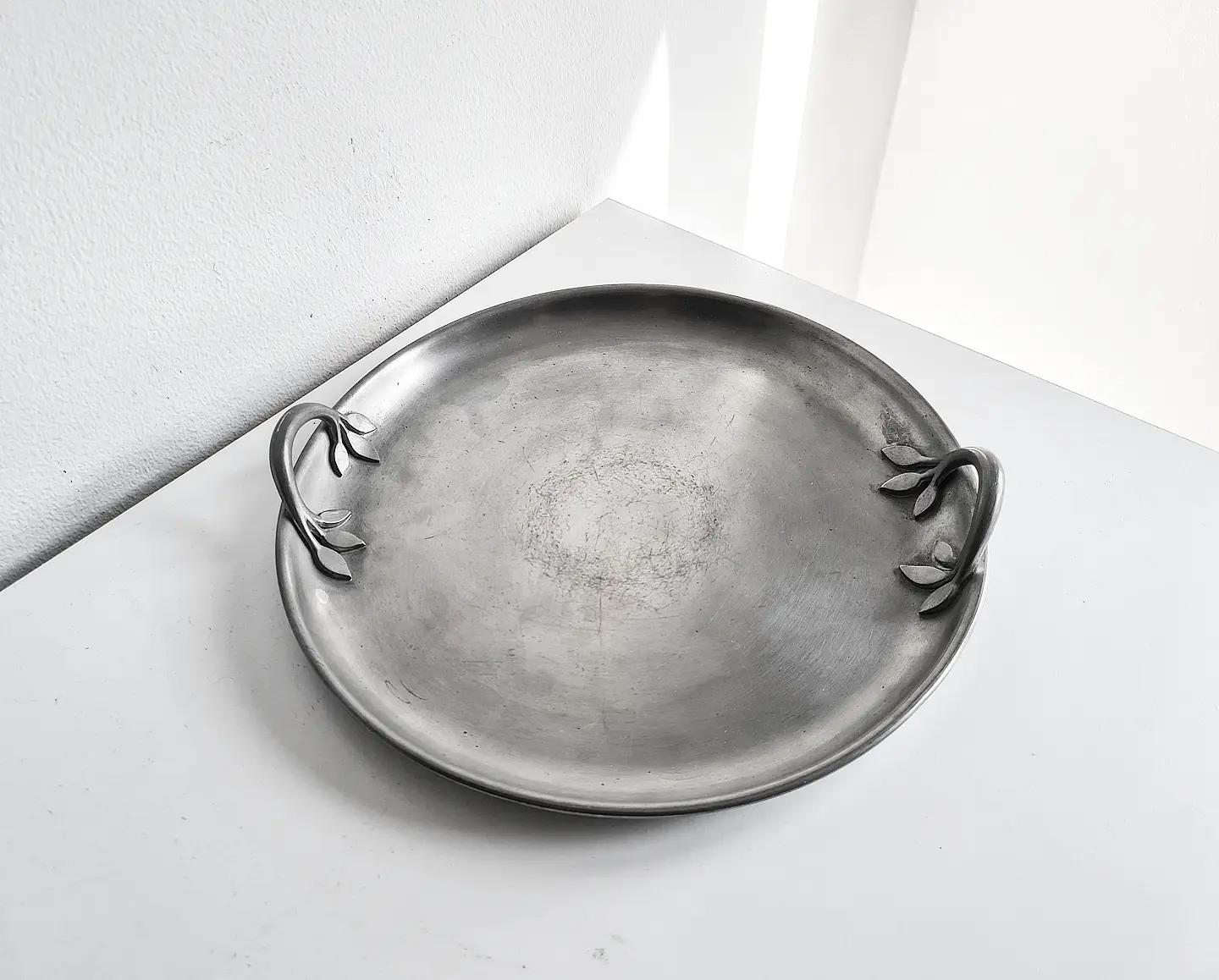 Midcentury pewter tray with beautiful detail from Firma Svenskt Tenn -1953.
Wear consistent with age and use.