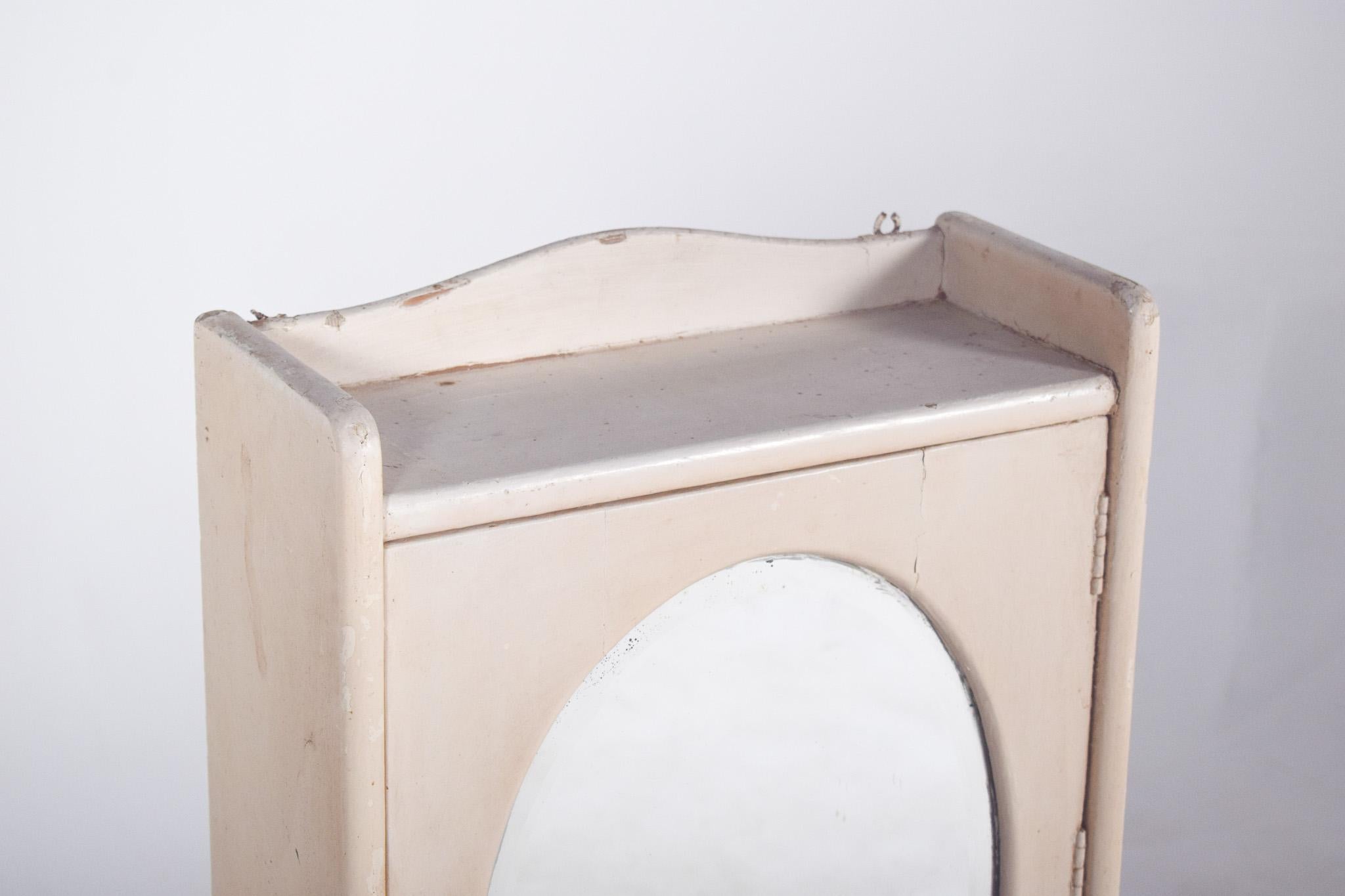 Modern Mid-Century Pharmacy Cabinet with Oval Mirror For Sale