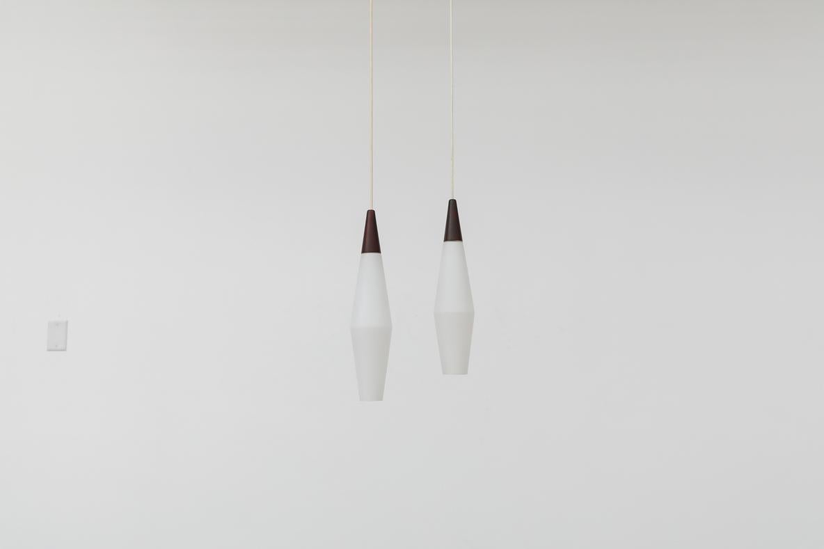 Mid-Century Modern Mid-Century Philips Opaline Milk Glass Pendants with Faux Rosewood Tops For Sale
