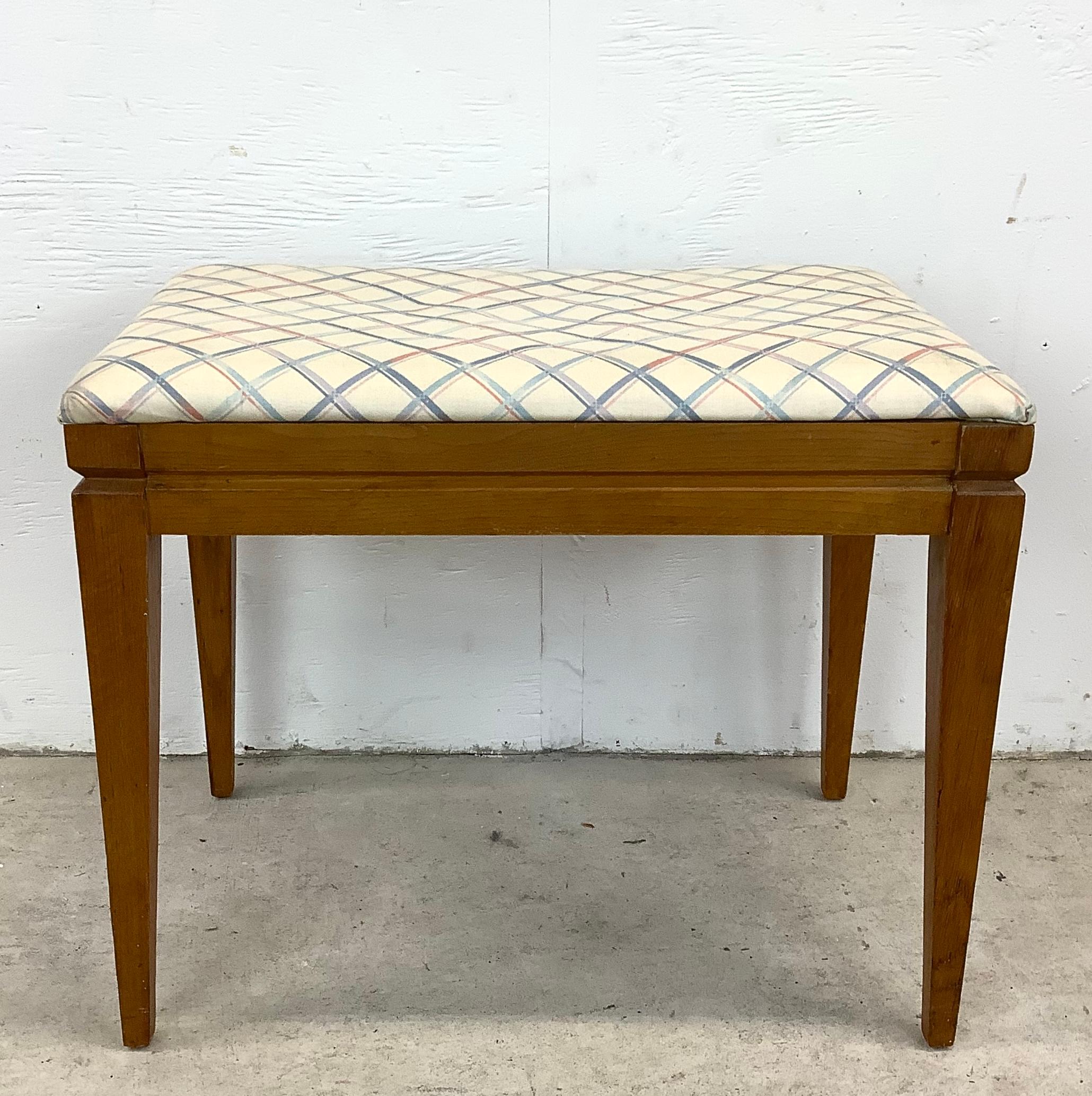 Elevate your home with the exquisite charm of this Mid-Century Modern Vanity Stool, a piece that reverberates with the style and grace of a bygone era. Inspired by the sleek designs of the 1950s and 60s, this stool presents a harmonious blend of
