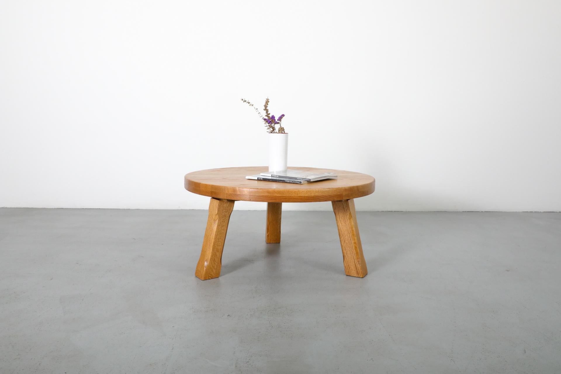 Mid-Century, Pierre Chapo inspired, Brutalist coffee table made from solid oak. The wood has visible wear and patina and is in original condition with wear that is consistent with its age and use. Several other similar tables are available and