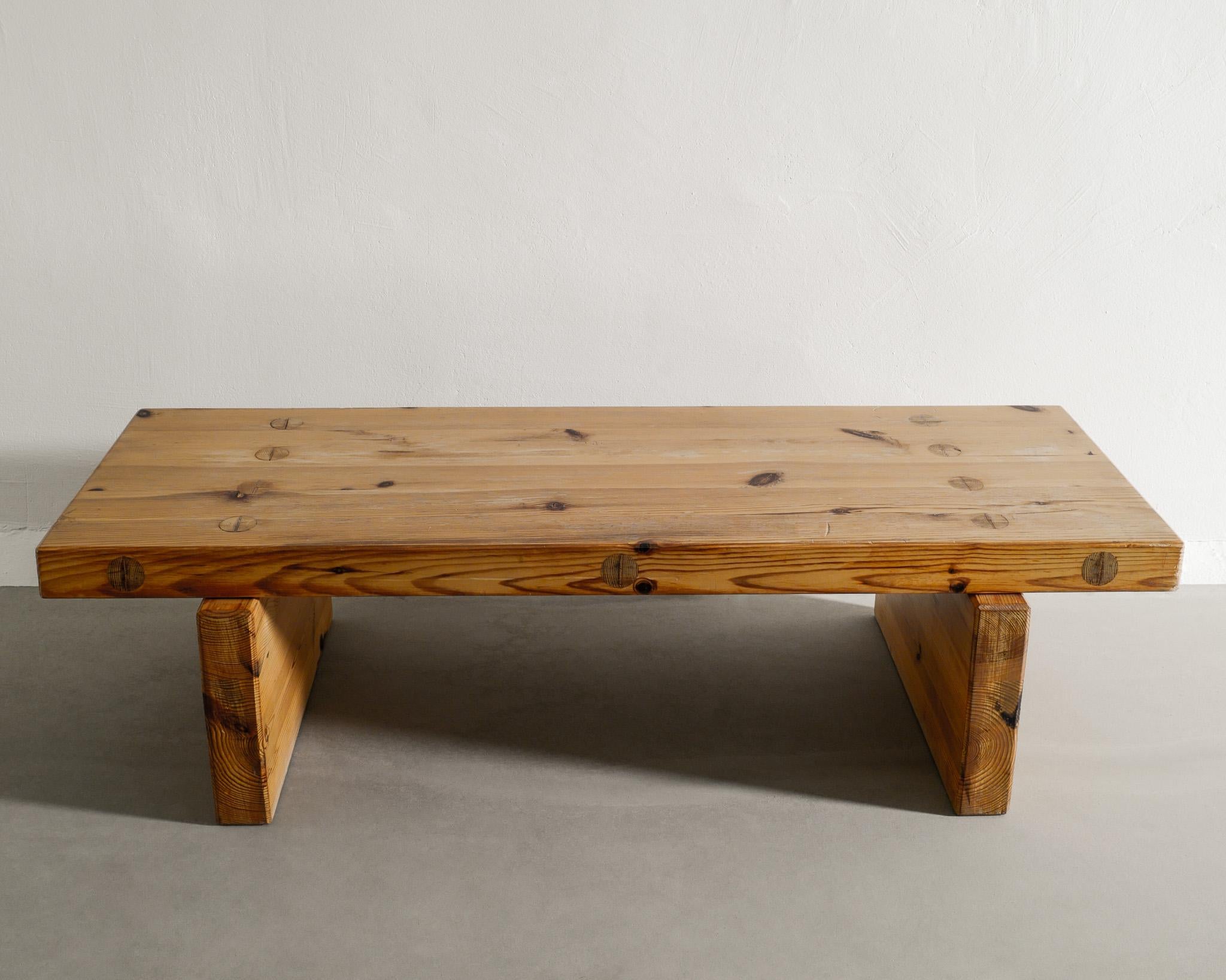 Rare mid century bench / coffee sofa table in solid pine by Roland Wilhelmsson dated March 1970. In good original condition. Signed. 
Perfect as a smaller table or bench behind the bed. 
It is this and our bench in all styled photos. 

Dimensions: