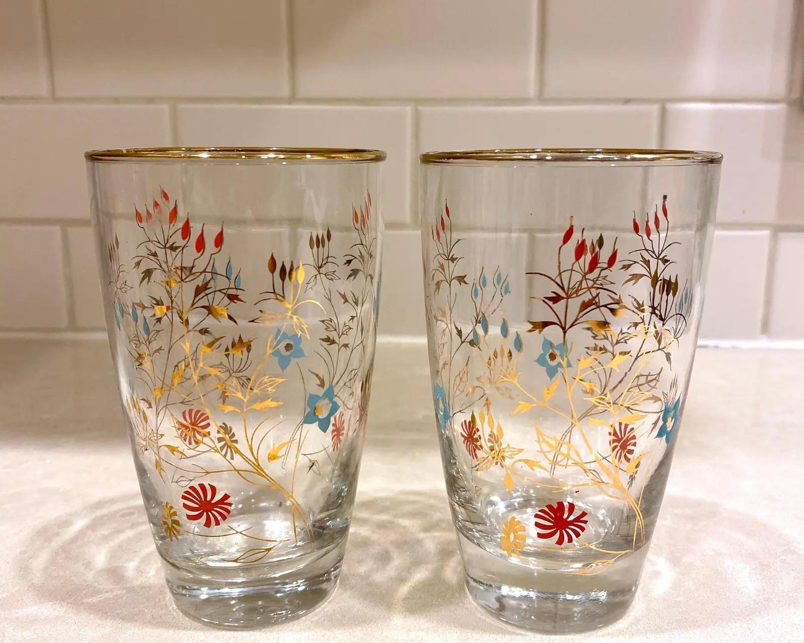 Pink and turquoise floral glasses with gold accents and gold rims. These are my favorite and the last I have in this pattern.