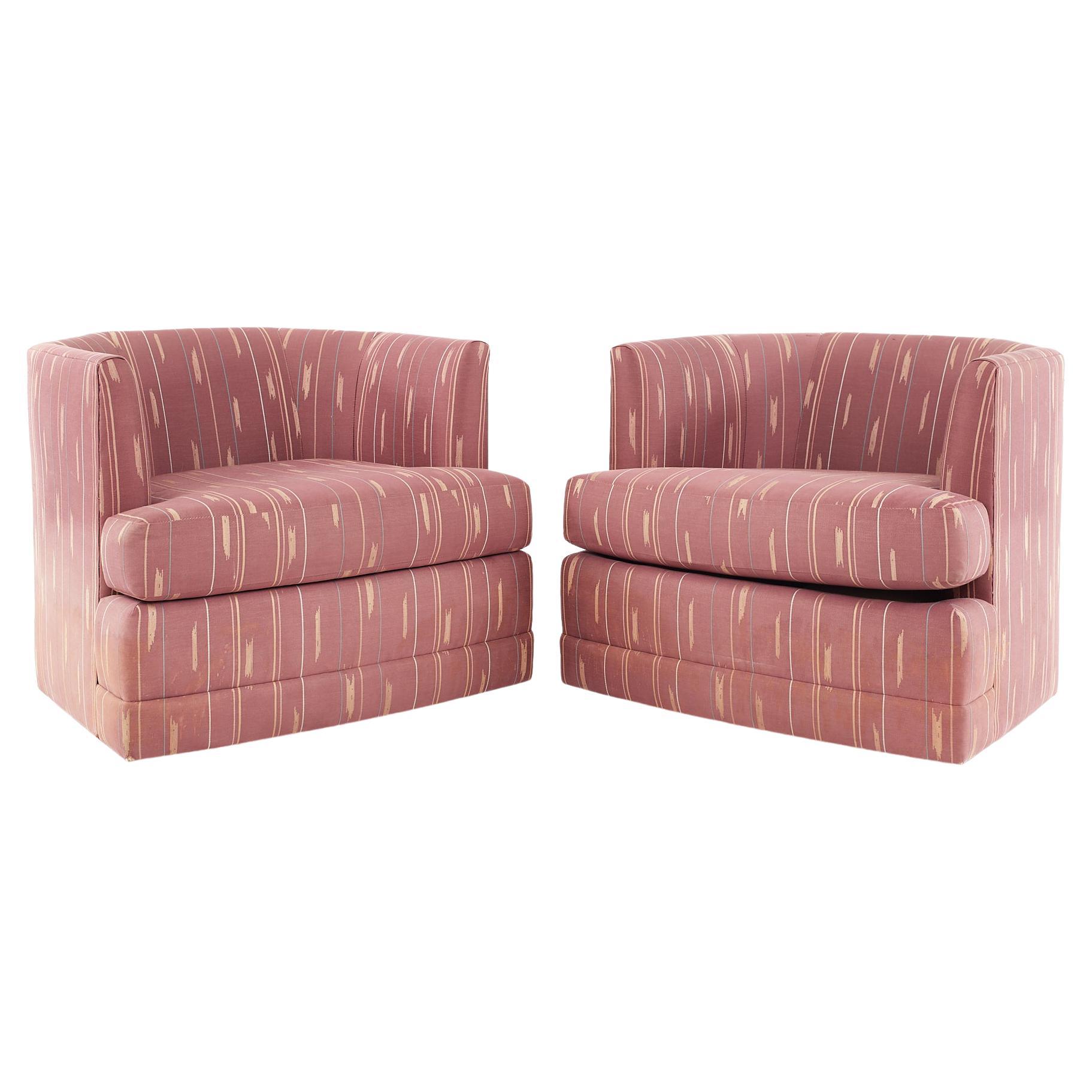 Pair Pink swivel tub chairs at 1stDibs