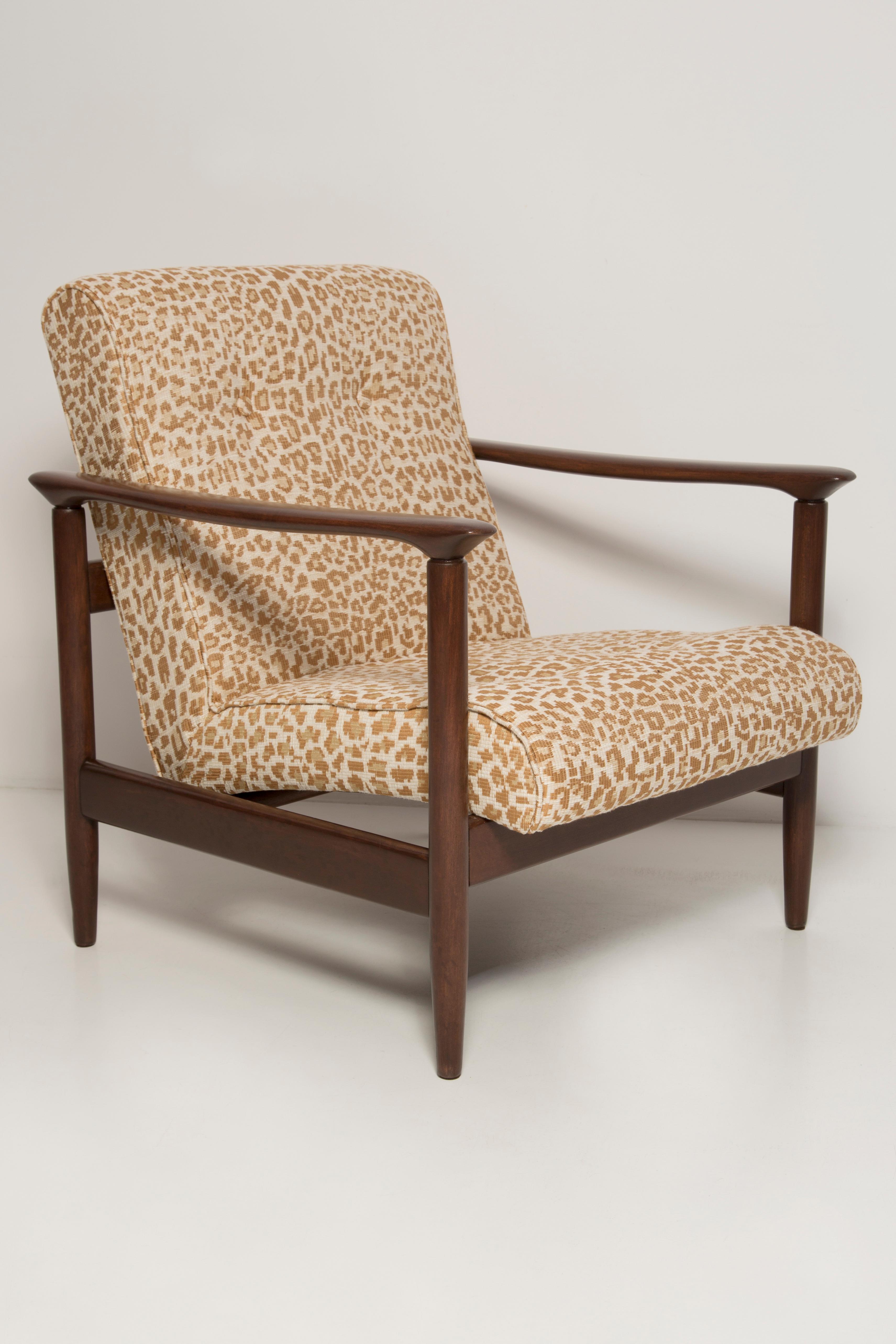 Beautiful leopard armchair GFM-142, designed by Edmund Homa, a polish architect, designer of Industrial Design and interior architecture, professor at the Academy of Fine Arts in Gdansk. 

The armchair was made in the 1960s in the Gosciecinska
